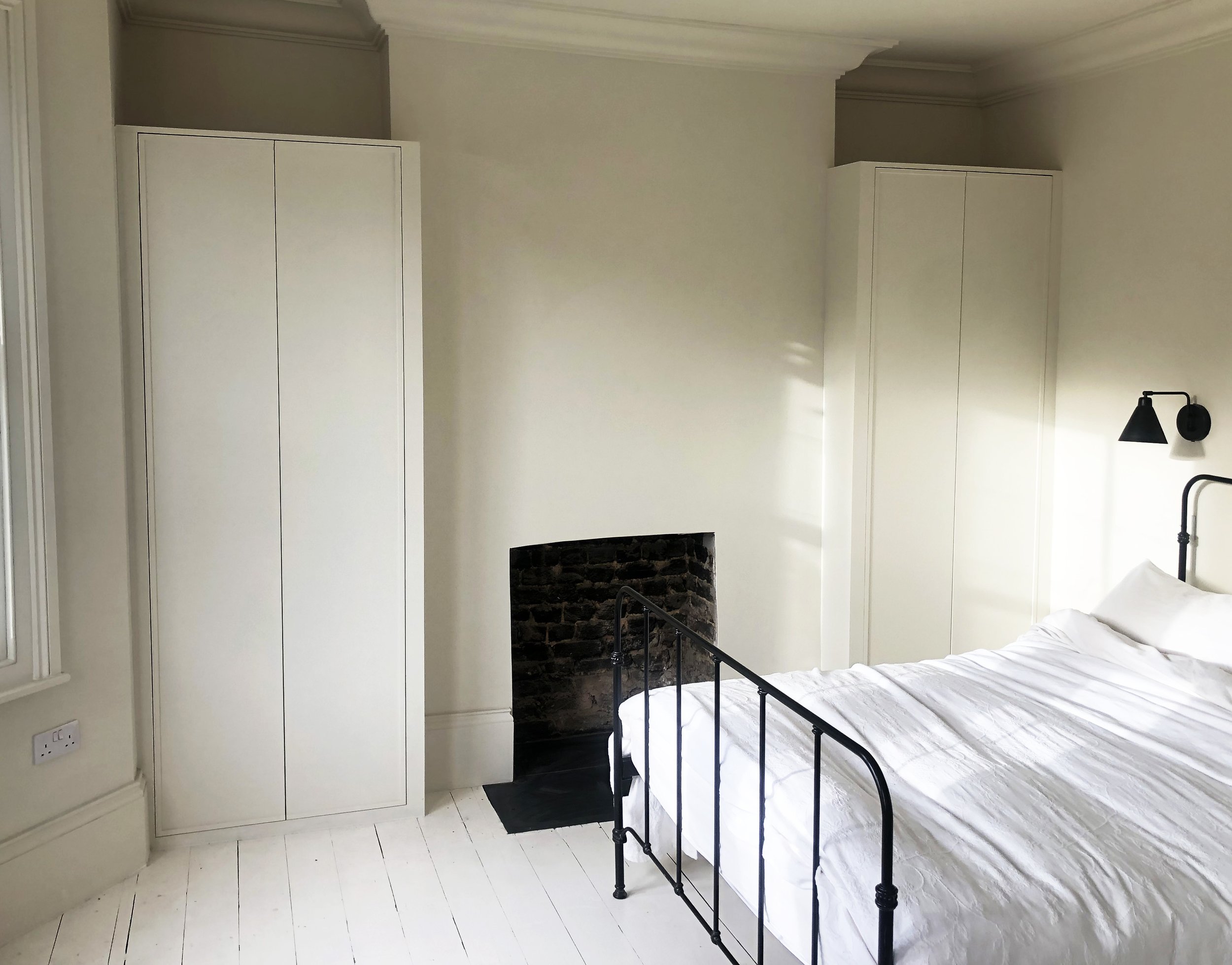 Handmade bespoke twin wardrobes.