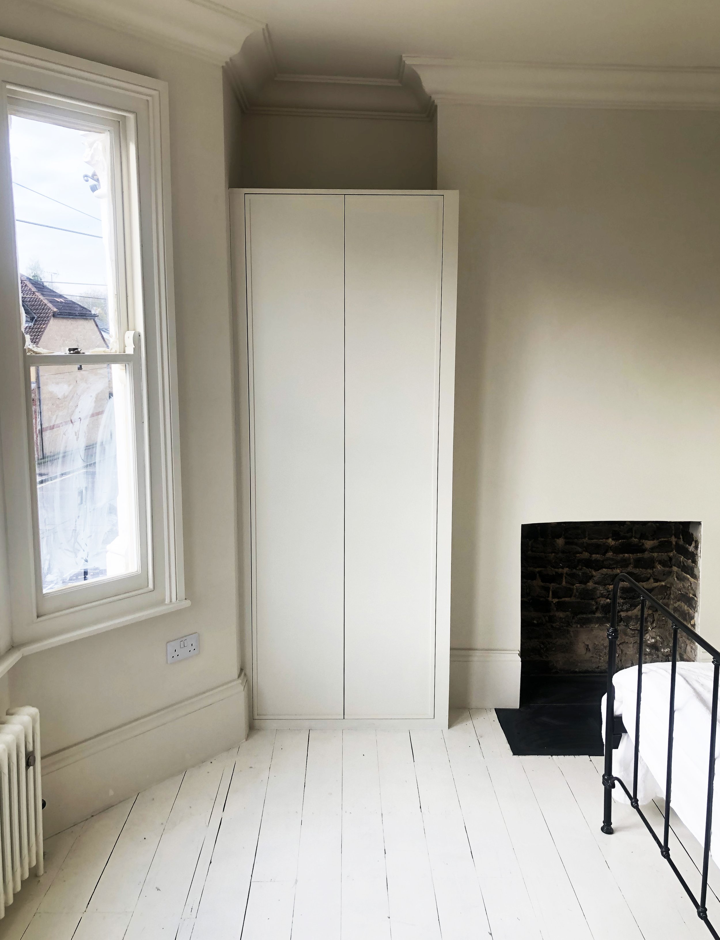 Handmade bespoke twin wardrobes.