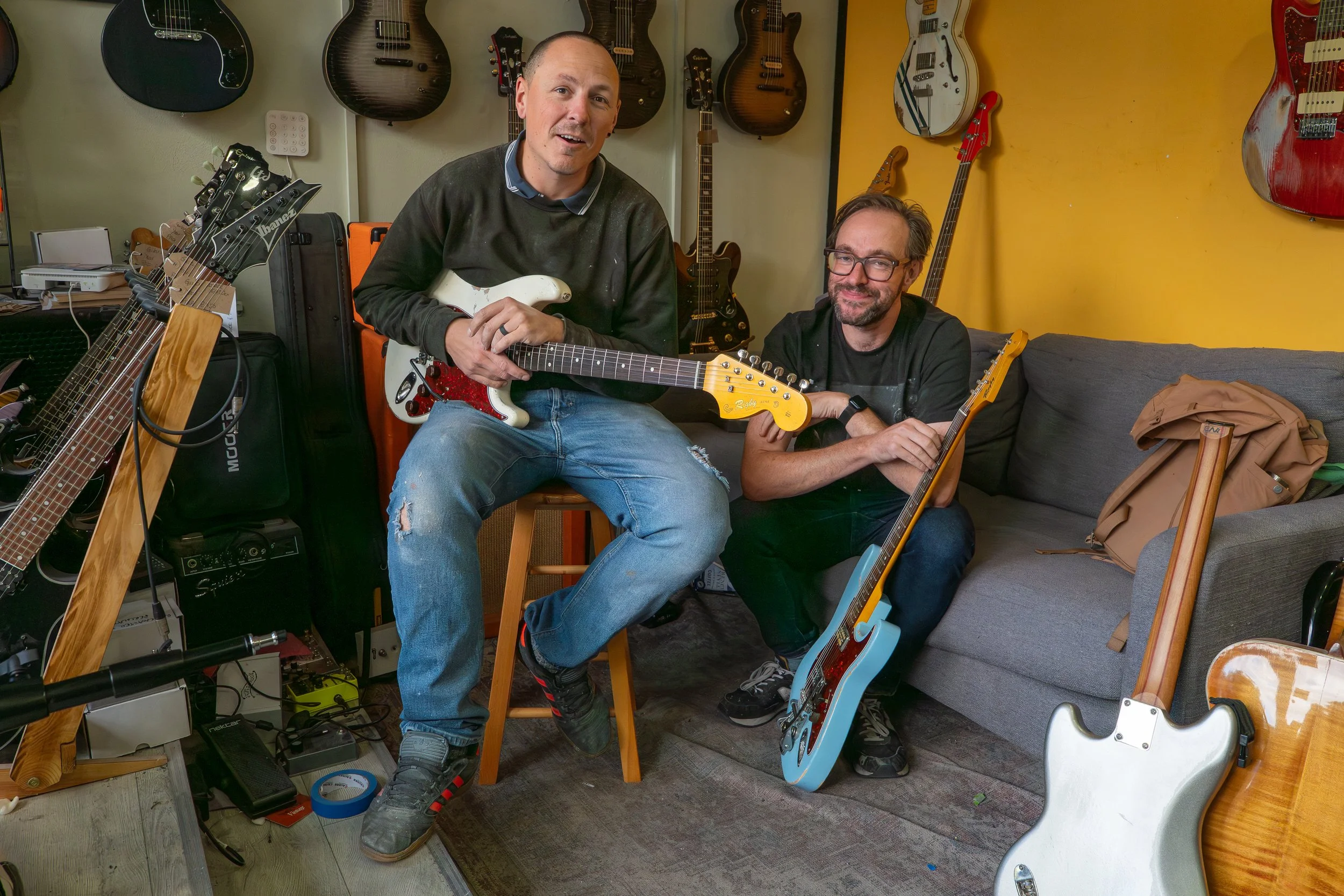 Pete Rigby, owner with head of finishing Pete both with custom rigby Guitars in the Shop Rigby Music