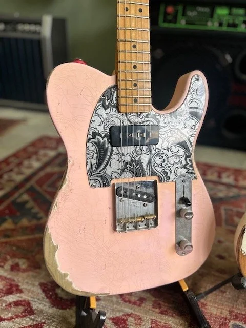 heavy reliced telecaster, maple neck, pink body, B&W paisly pickguard and P90 bridge pickup
