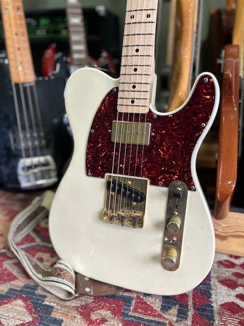 white telecaster reliced with humbucker bridge pickup only, tortiseshell pickguard, brass bridge, reliced with maple neck