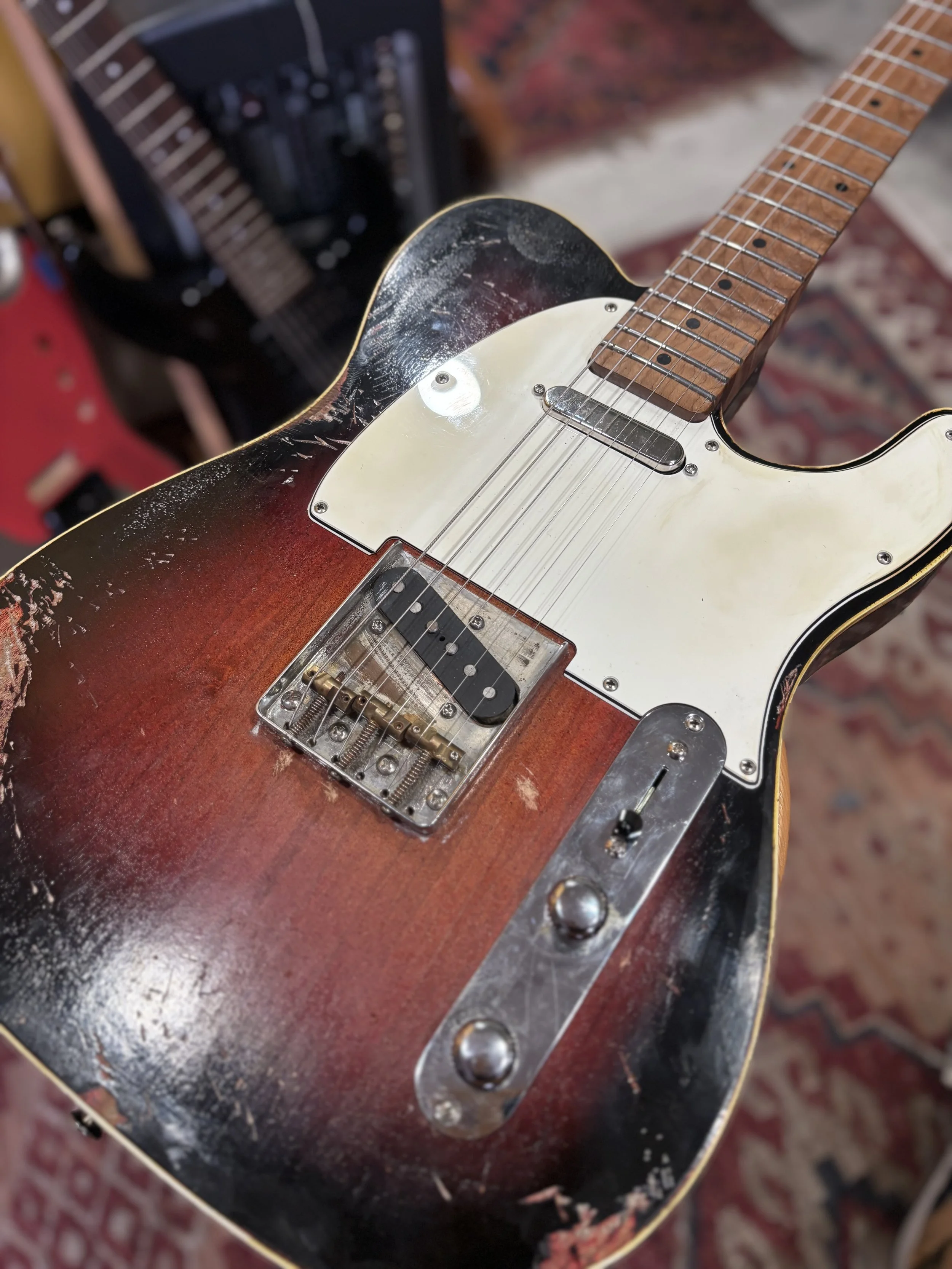 Custom Classic Telecaster, reliced brown sunburst & white pickguard.