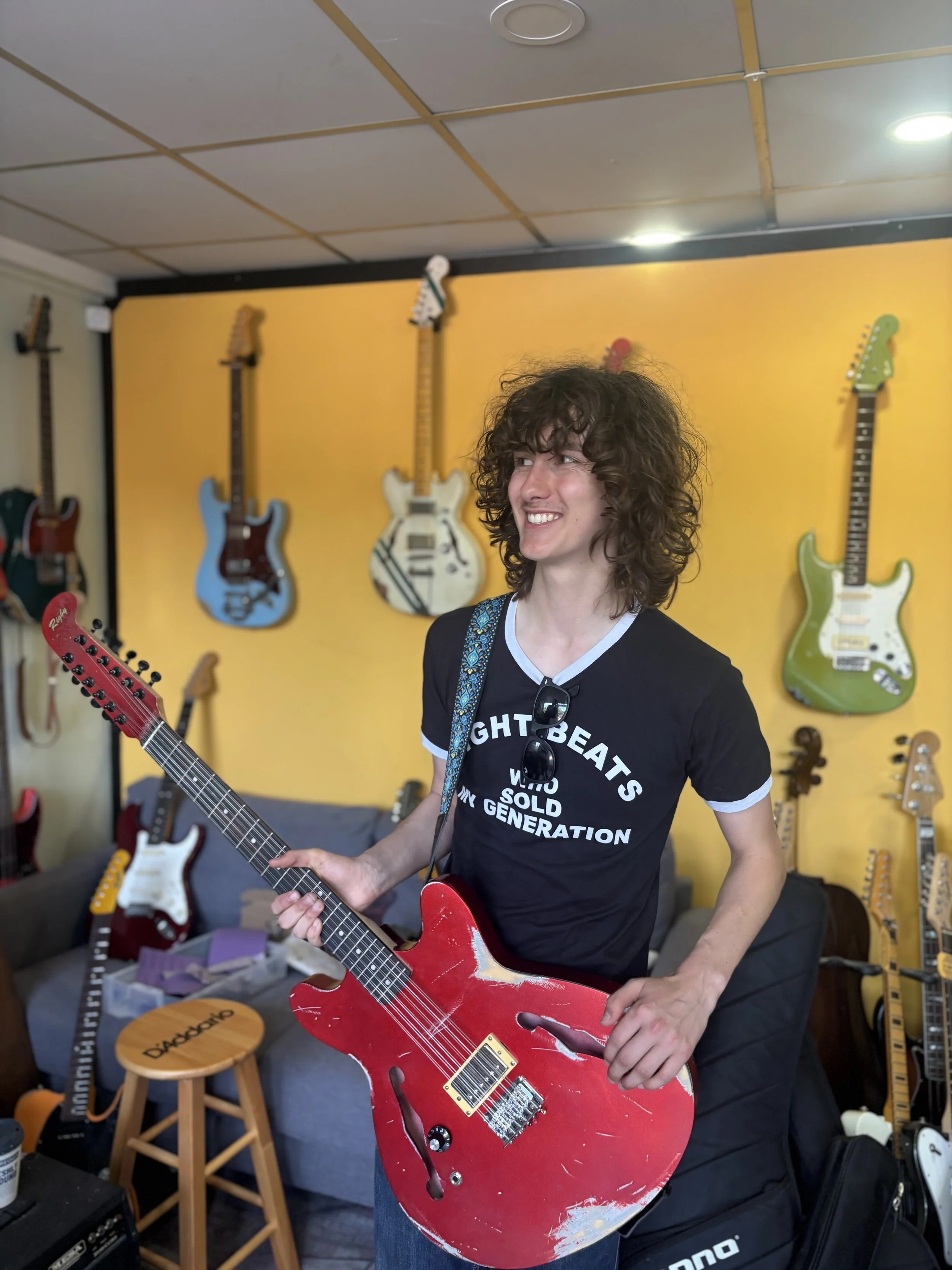 happy customer with semi hollow red reliced 12 string. rosewood neck and humbucker.