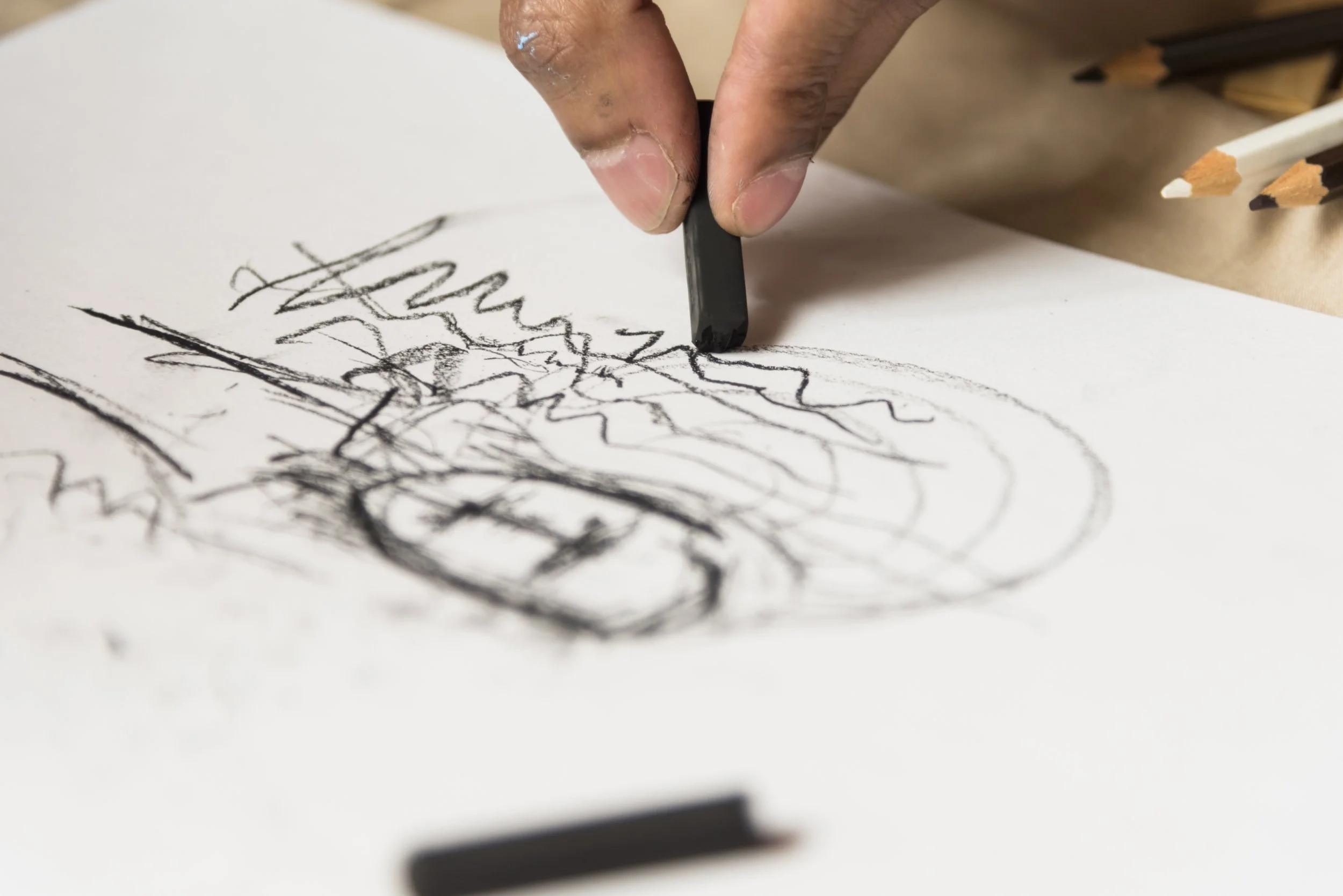 boy-drawing-with-charcoal.jpg