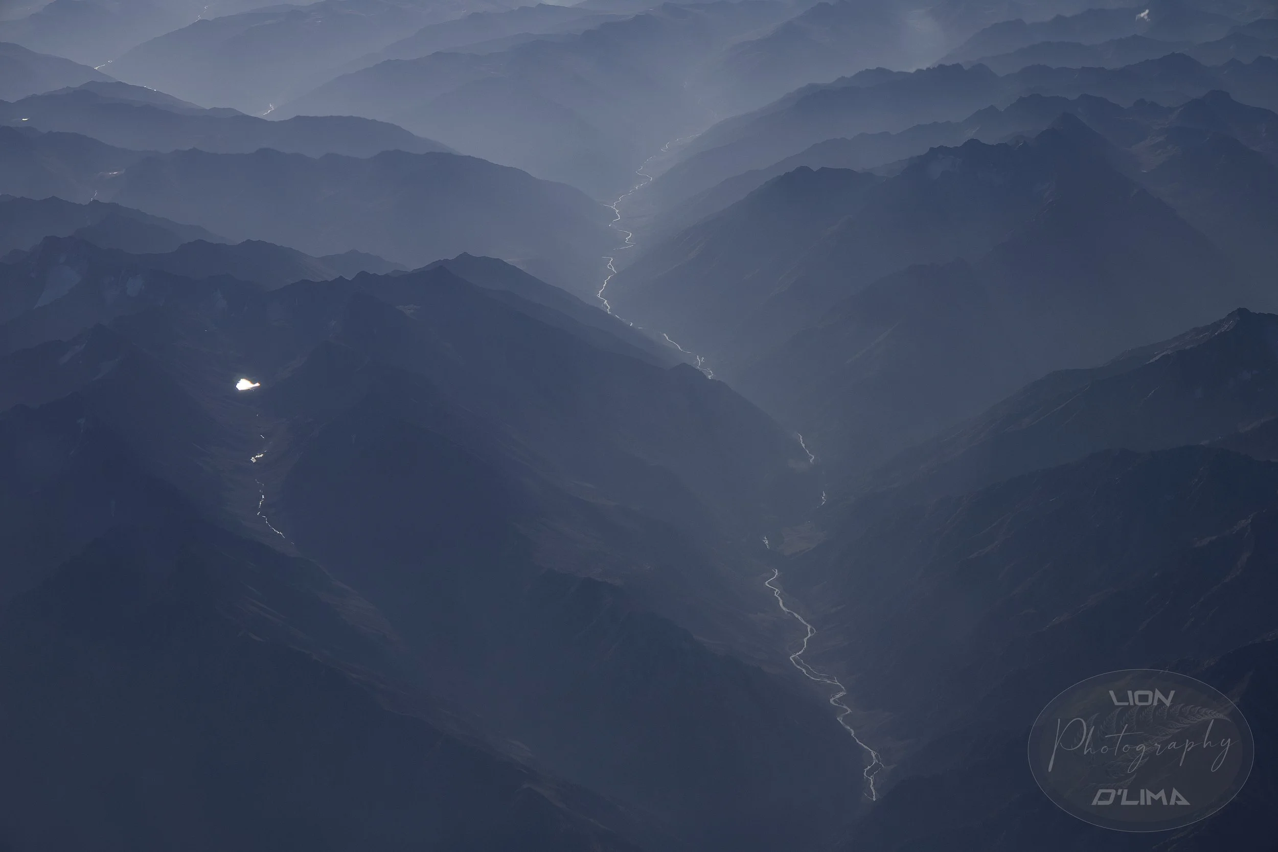 A river running through a valley in the Himalayas