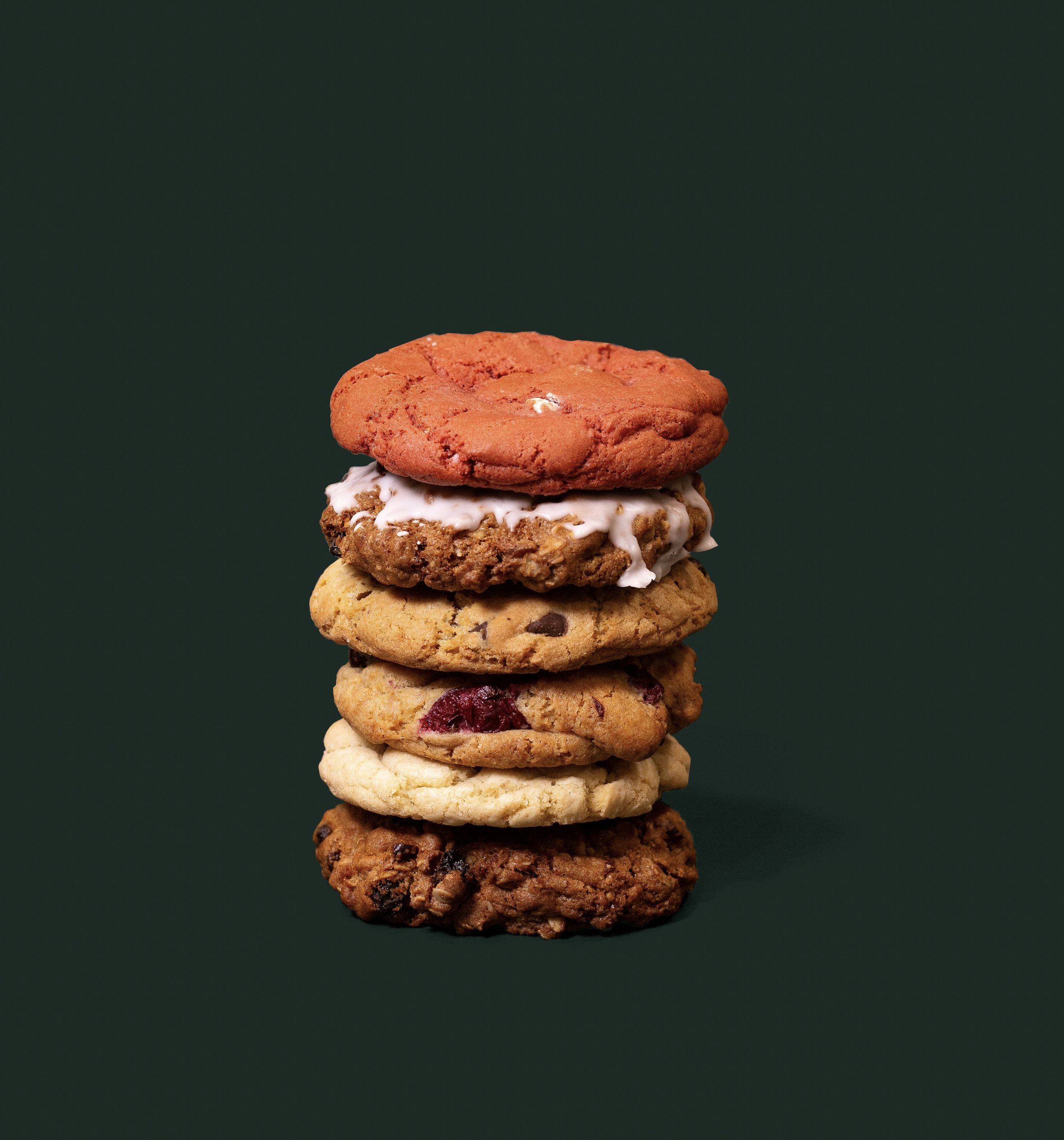 Gourmet Cookie Line up: Red Velvet, Iced Oatmeal Raisin, Chocolate Chip, White Chocolate Cranberry, Lemon Cream, Oatmeal Raisin (Plain). Not Pictured: NEW Peanut Butter Cookie.