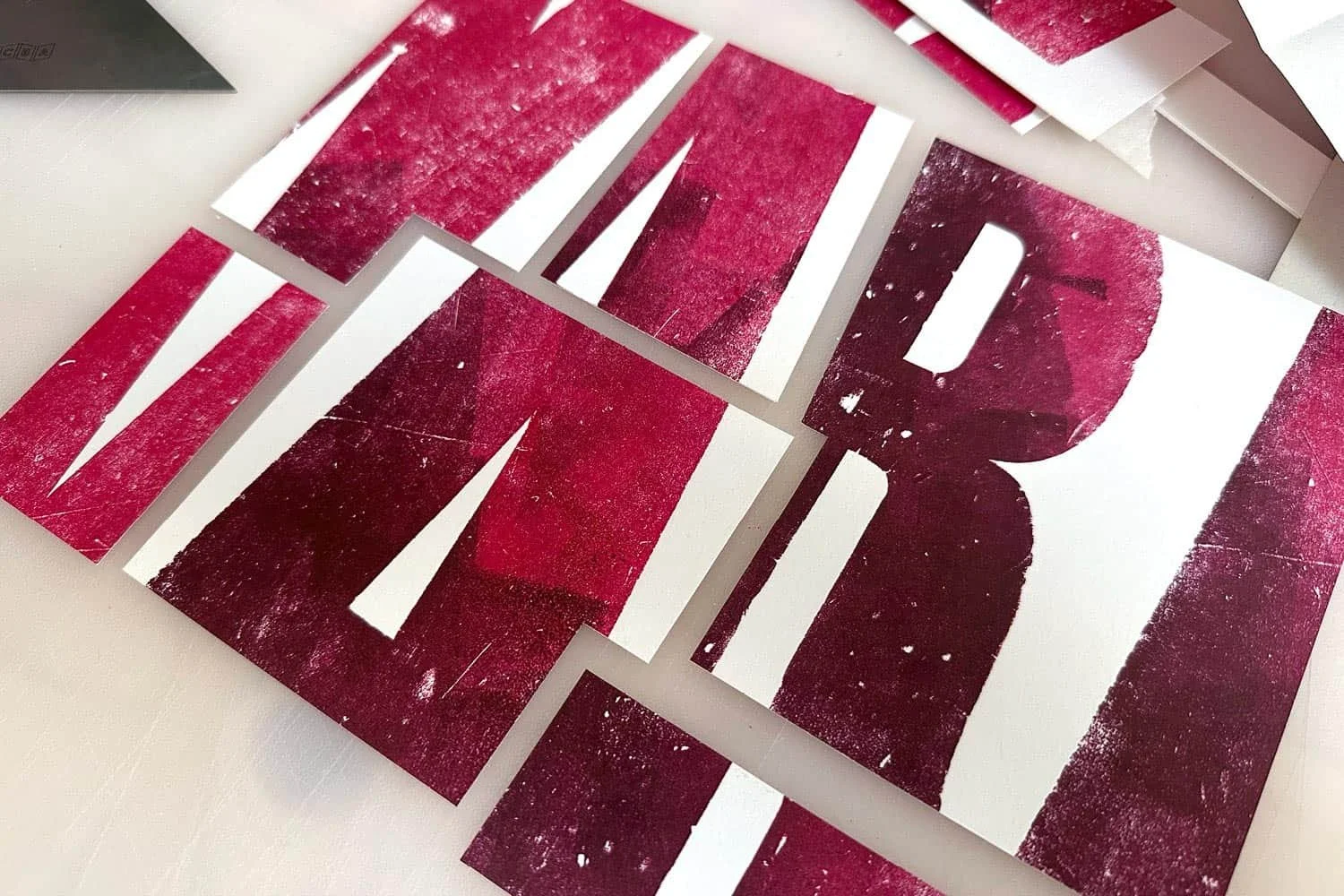 Letterpress printed elements ready for marquetry