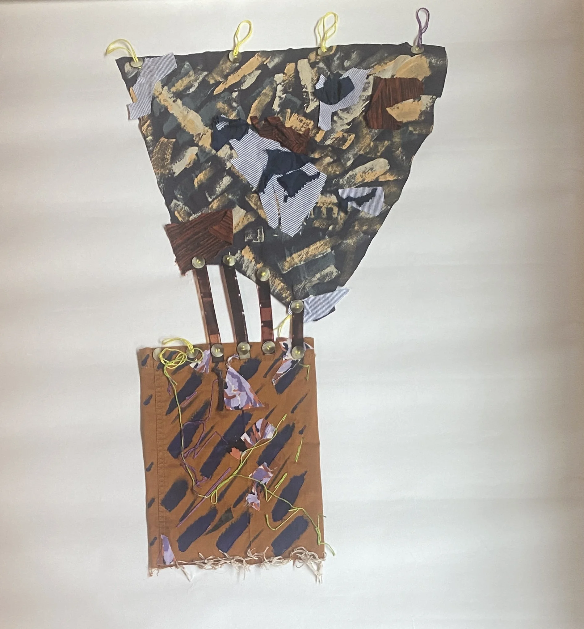 Spinning Tales #11 (Series), 2023. Acrylic paint, recycled fabric and buttons, embroidery floss, and film negatives, 17" x 29".