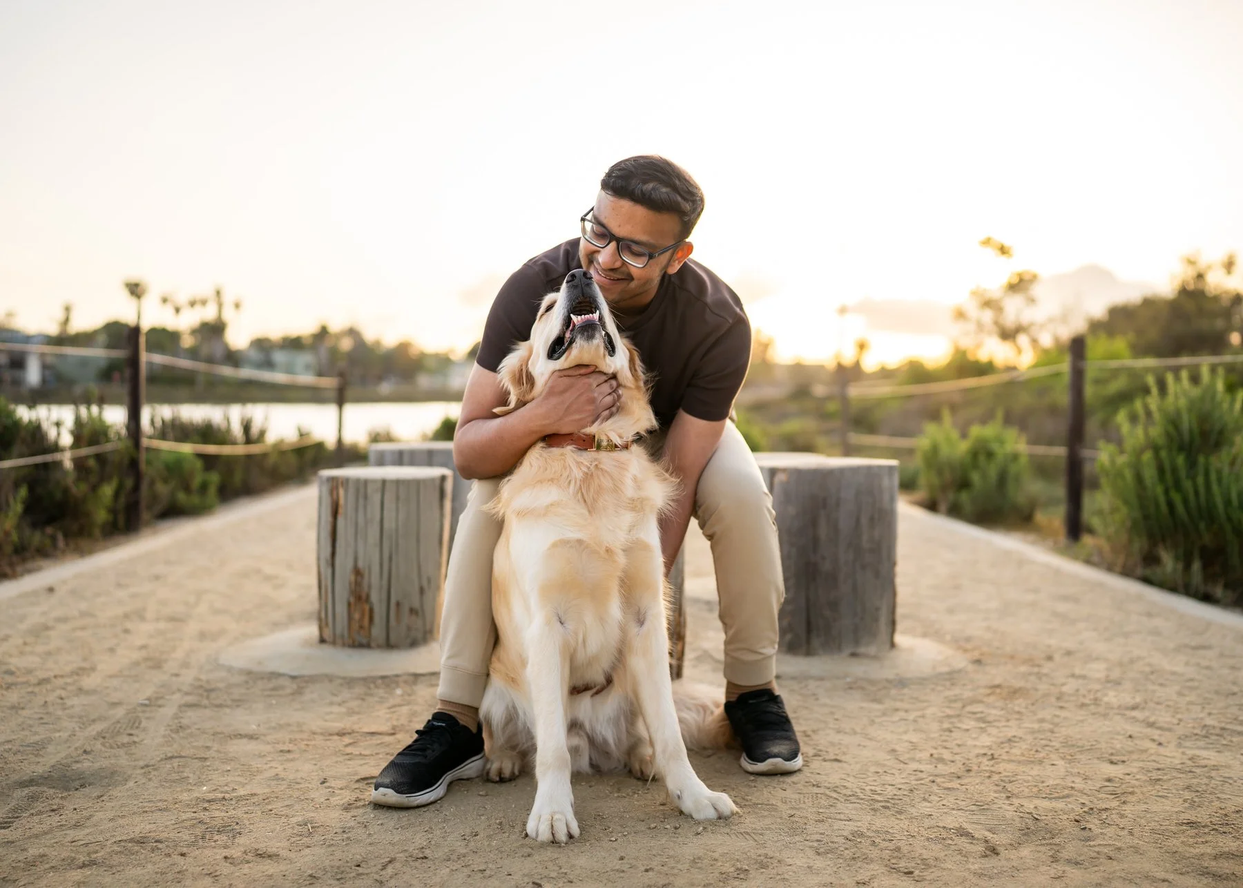 Argo Sitting with His Dad Getting a Hug.jpg