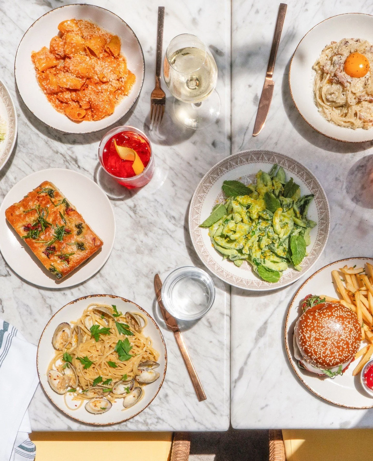 Pasta, burgers, and fresh salads await you 🌞