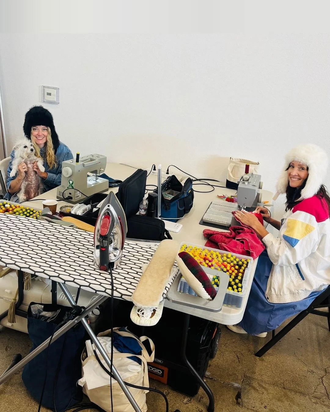 Blackbird tailors Heather Sansky (@heather_sansky) and Nina Walker (@ninaskywalker) sewing in style behind the scenes at @gap, with quality control inspector @dolly.on.set 🐾⭐️