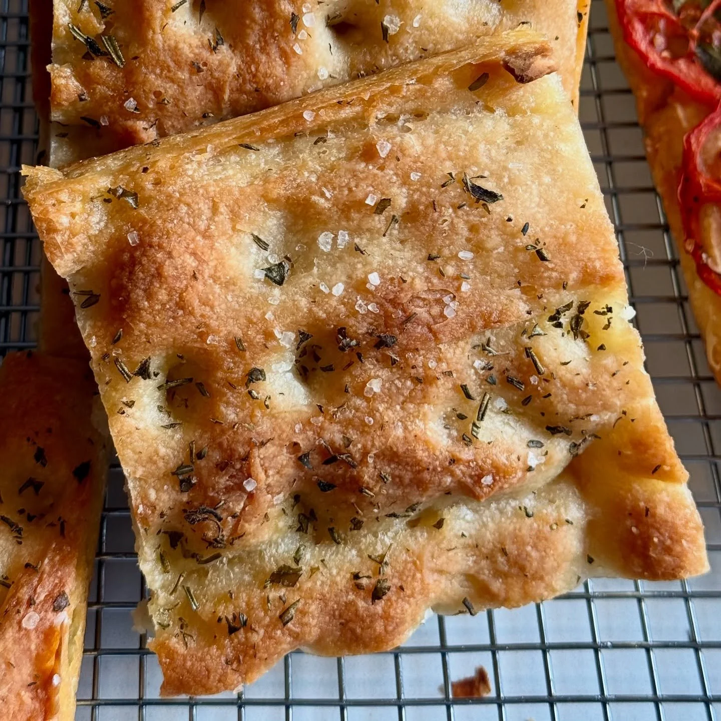 Our focaccia is 100% gluten free, totally vegan, and completely codependent!

It&rsquo;s also really, really good&mdash;it&rsquo;s got this great, big crusty-chewy texture, shot through with a deep olive oil silkiness, a little bit of garlic, and a s