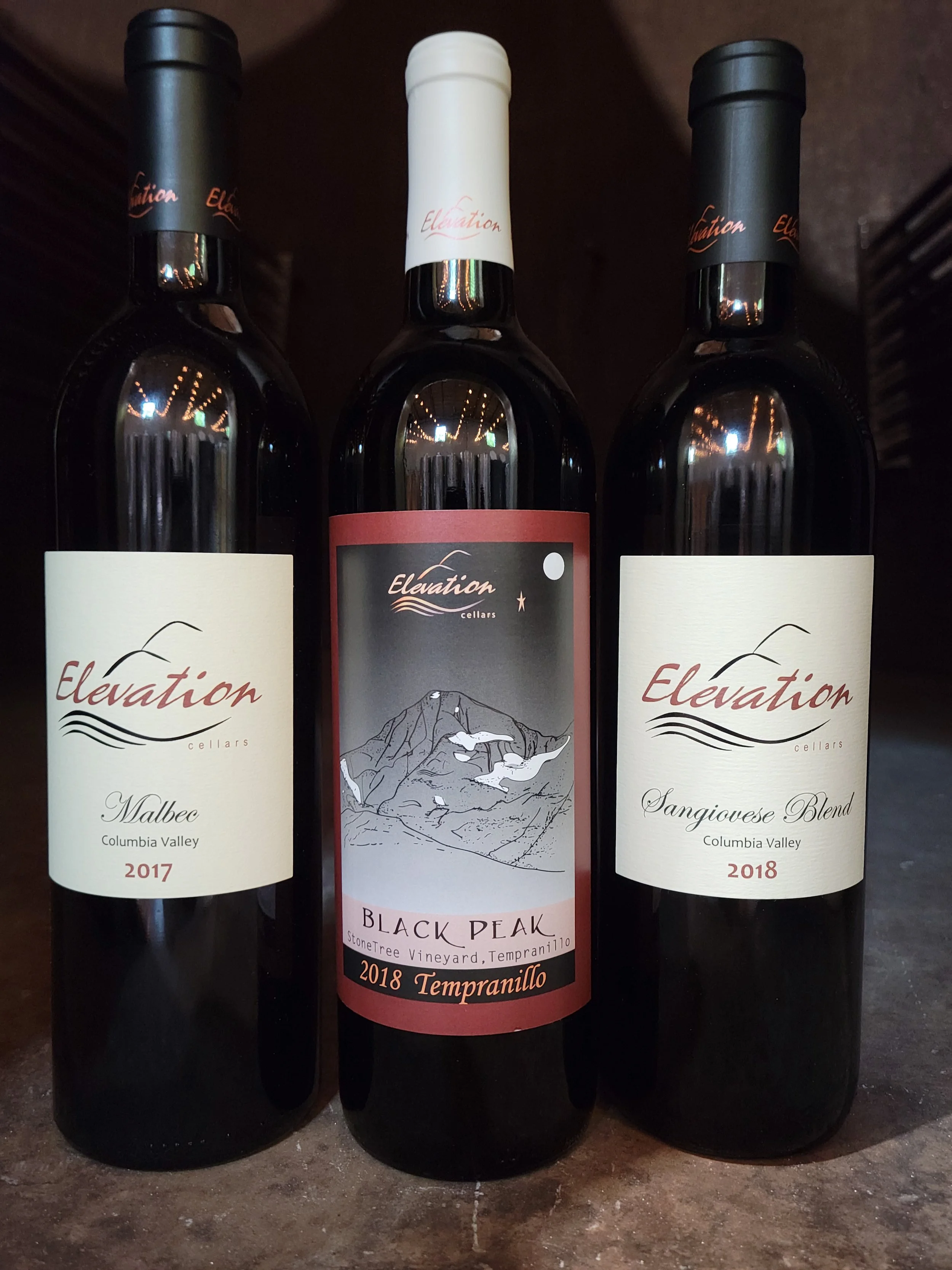 # Bottles of Red wine - Sangiovese Blend, Tempranillo, and Malbec