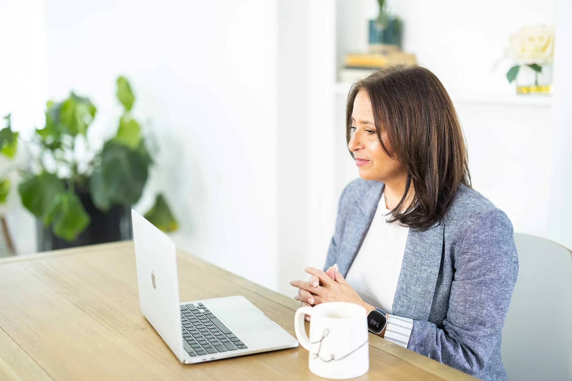 Divorce coach Lisa Lisser meeting virtually with a client from her office in New Jersey.