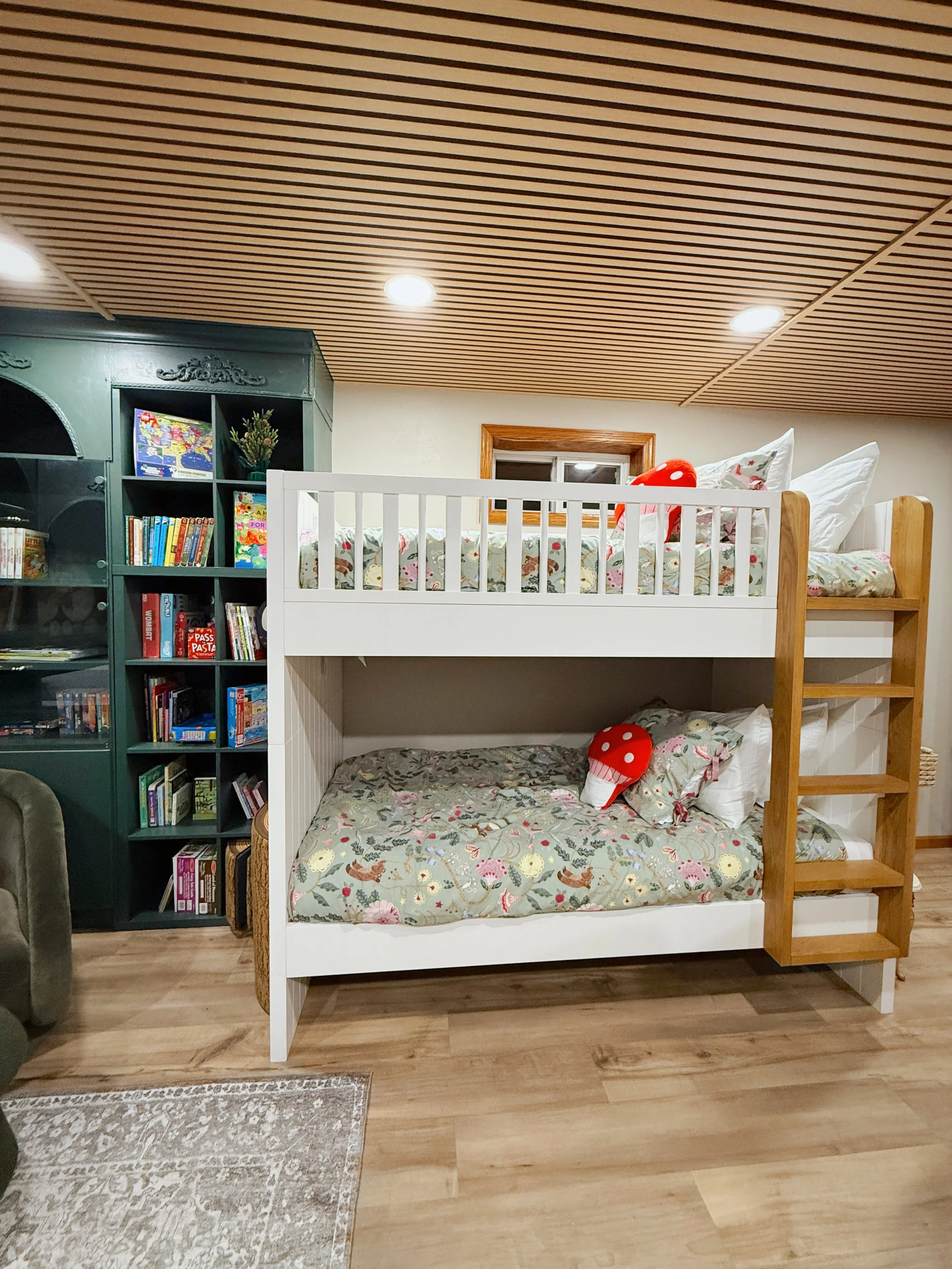 cute kids white bunk bed with forest bedding