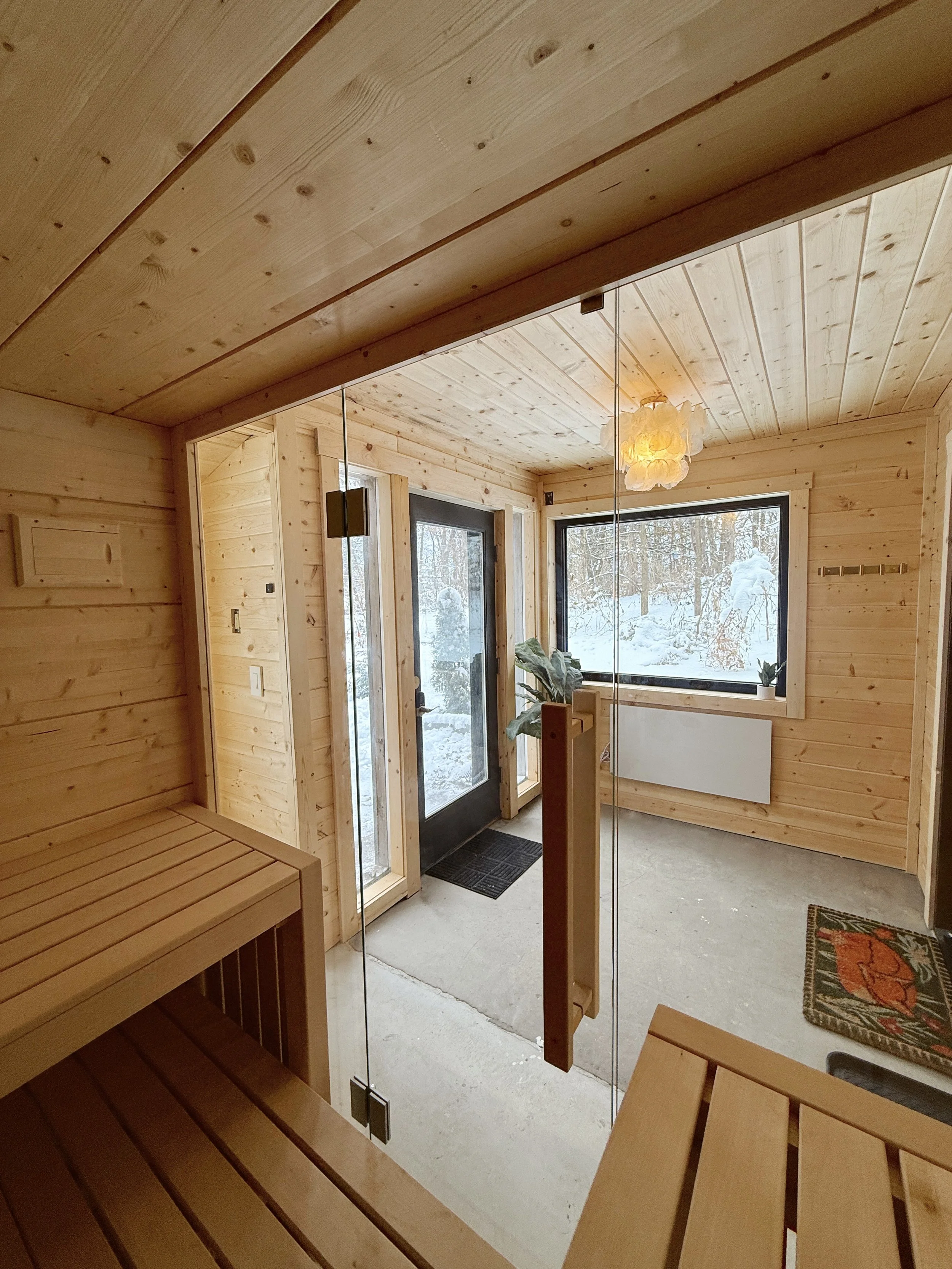 inside wood sauna view to outdoor windows