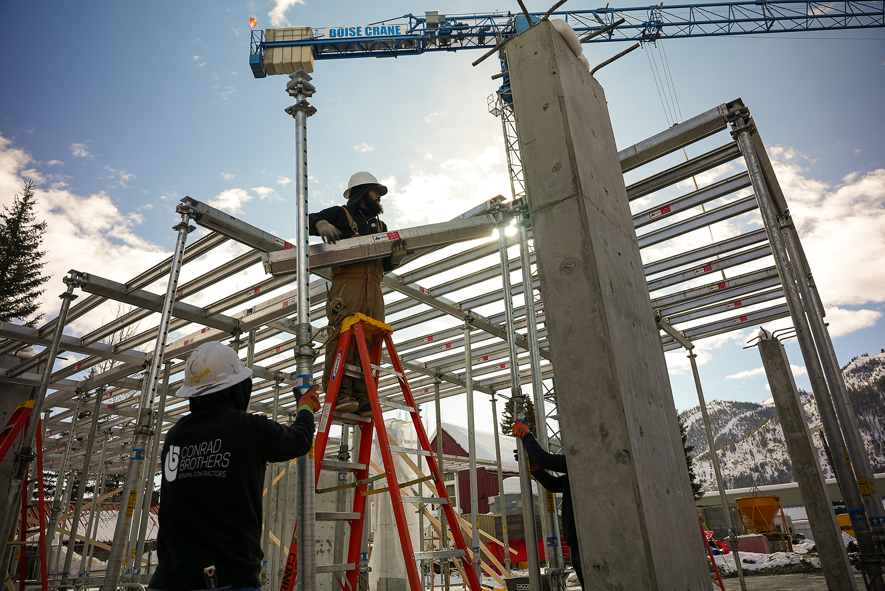 Workers installing framing at Bluebird Village Ketchum Idaho Commercial construction Ketchum