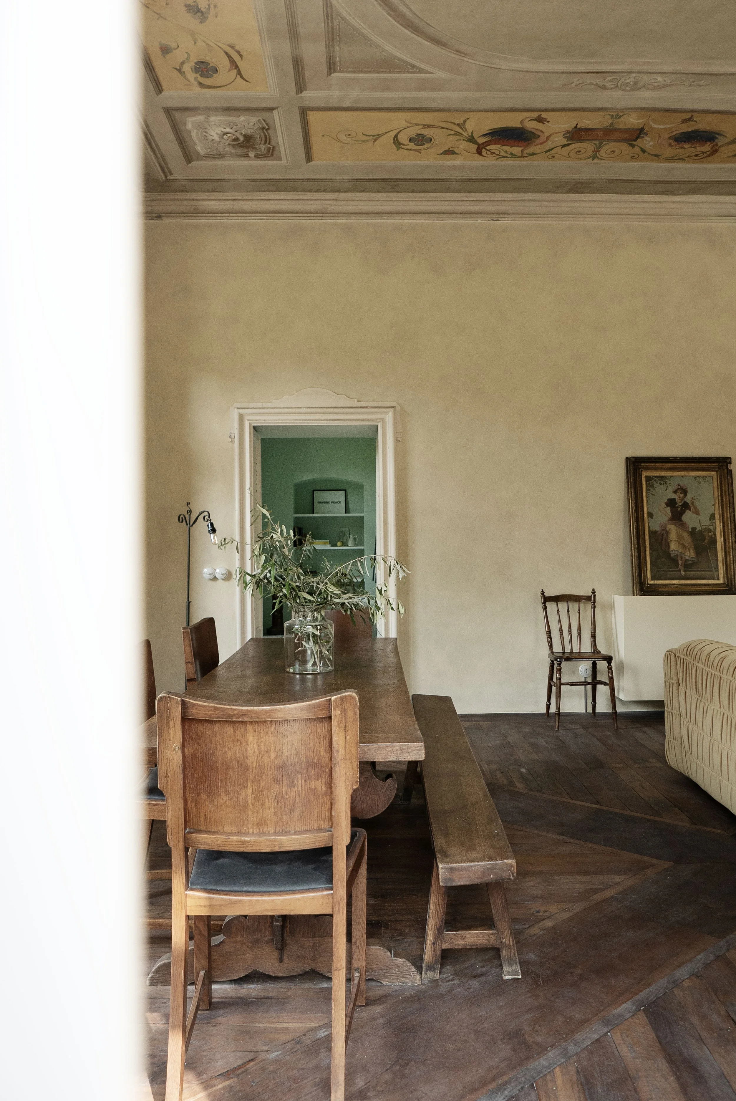 The Hideaway apartment near Lake Como by Studio Navet — frescoed ceilings and Venetian terrazzo with modern furnishings.