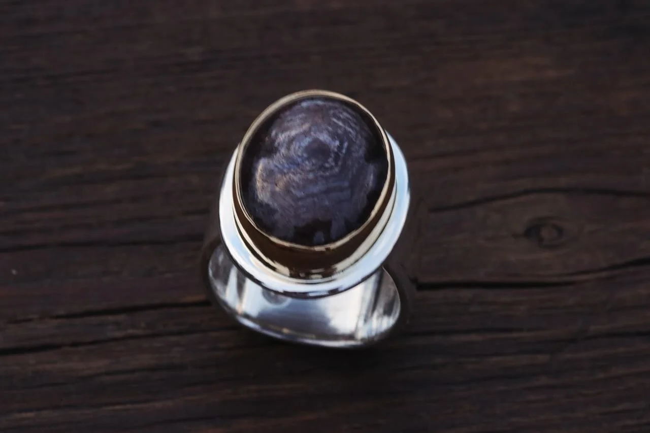 The trigonal crystal structure in this sapphire cabochon isn&rsquo;t just a detail it&rsquo;s a marvel, as lovely as a perfect blue. Perfection is everywhere, if we bother to notice. Nature makes a world of it, but our eyes settle on one stone, one t