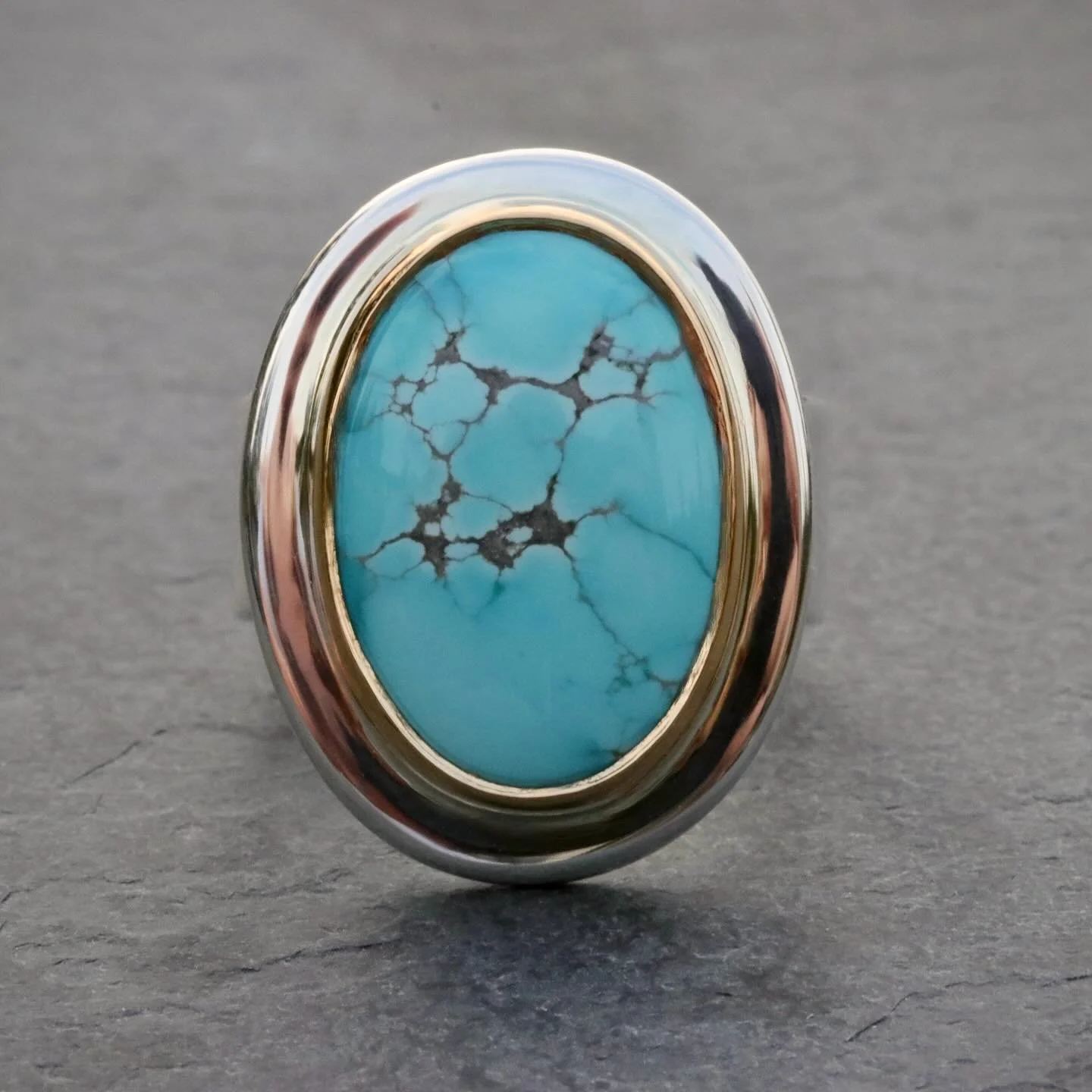 Setting the intention of the week with a calm straightforward approach. No bells or embellishments to distract the senses from what is. In this case, an untreated Number 8 mine turquoise with a soft matrix across a vibrant blue backdrop. Set in a cle