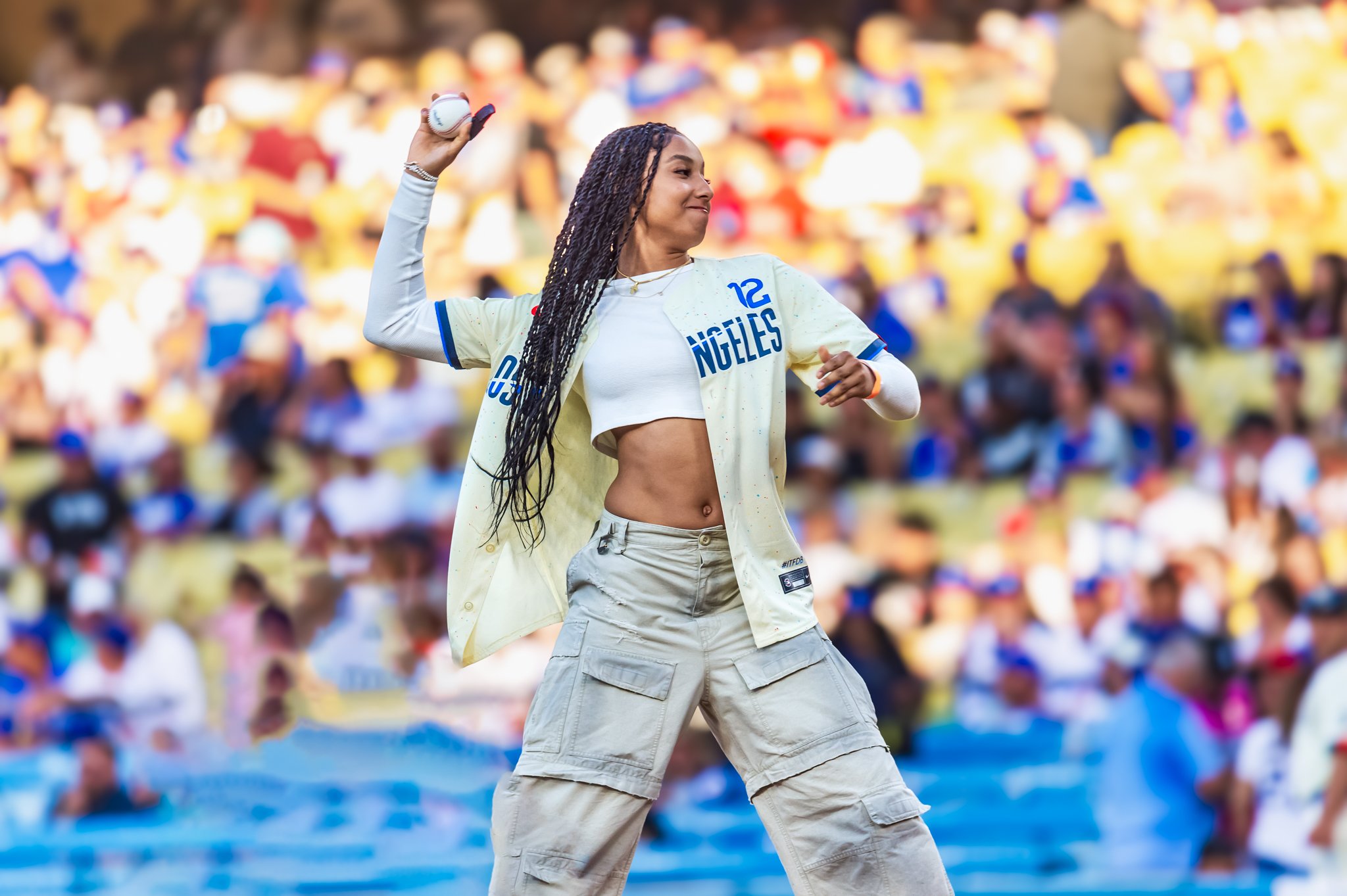 JuJu Watkins throws out the first pitch as the Dodgers bounced back to beat the Angels 7-2