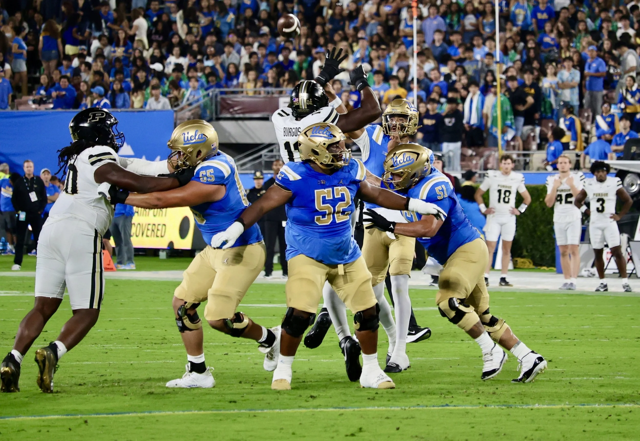 UCLA runs over Purdue 52-38 in high scoring Rose Bowl game