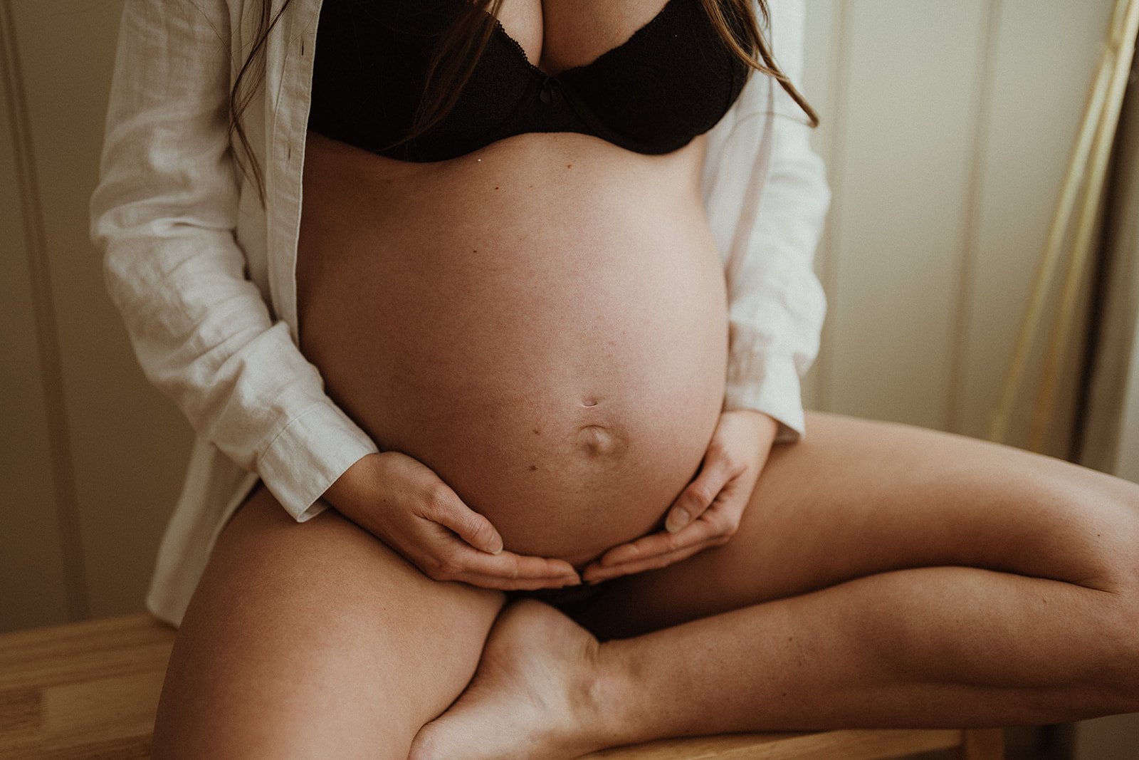 pregnant woman in underwear holding belly pregnancy services south west bunbury maternity health by nurture holistic clinic doctor