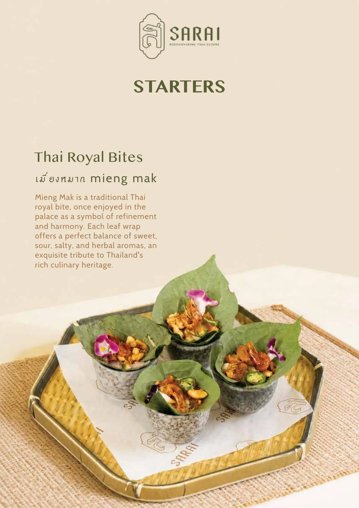 Mieng Mak, a traditional Thai royal bite of dried prawns and wild ginger wrapped in betel leaves, at Sarai Fine Thai