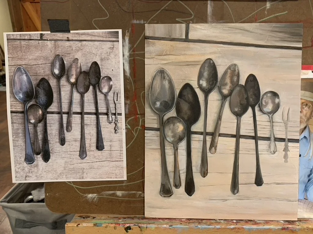 An oil painting on canvas of tarnished spoons