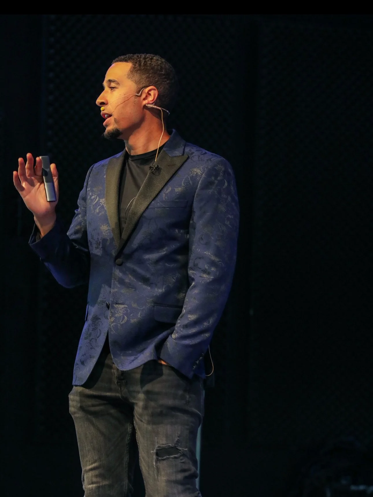 Ryan Tillman delivering a keynote on stage