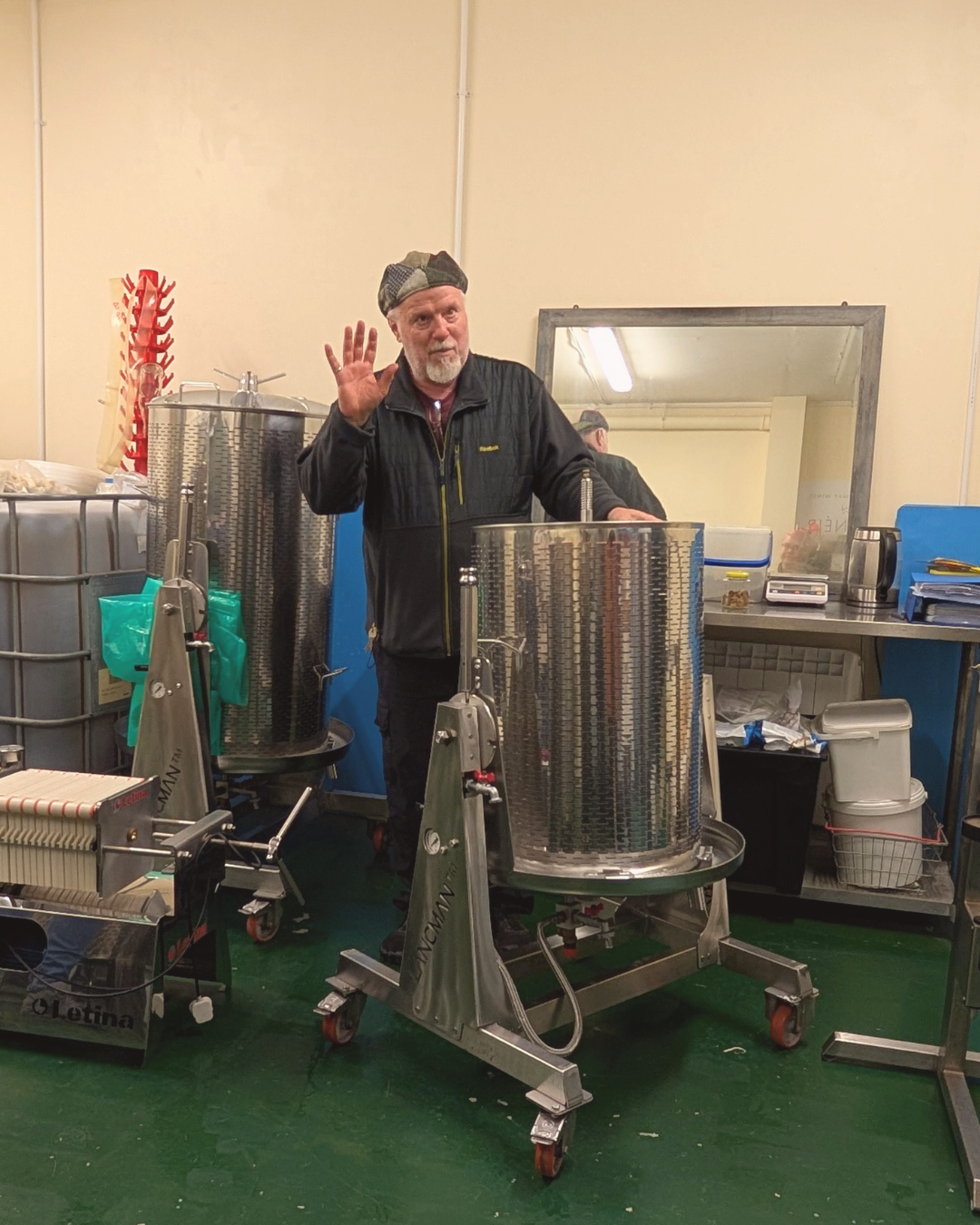 Brett Stephenson of Wicklow Way Wines talks about the berry winemaking process next to his press