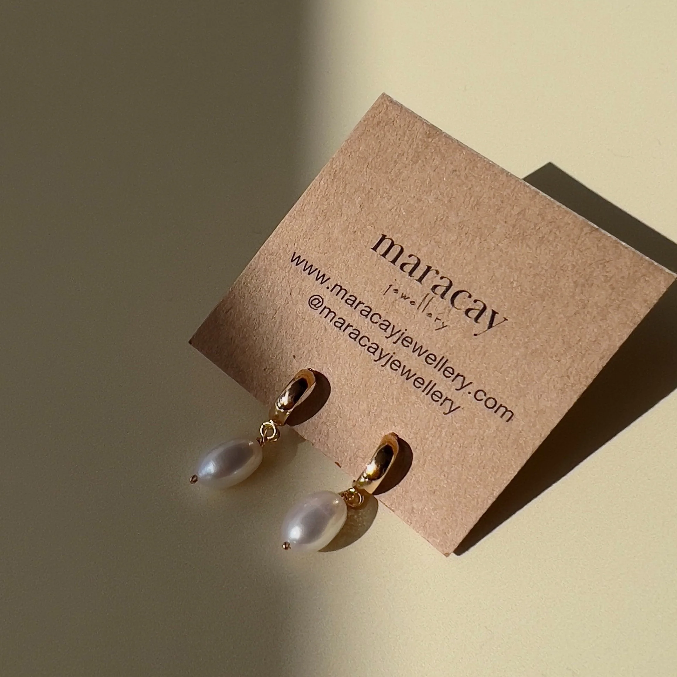 The+Staple+Pearl+Huggie+Earrings1.jpg