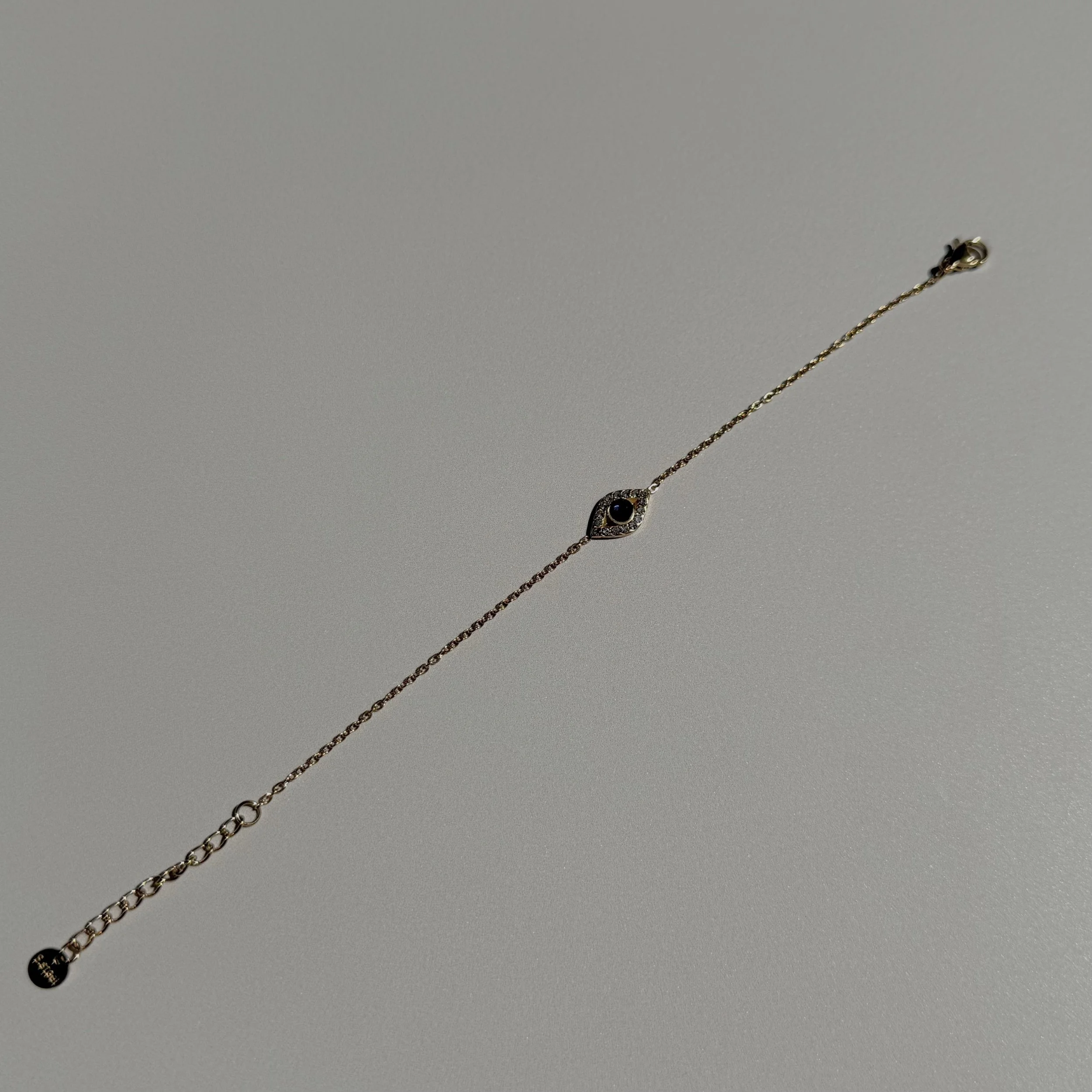 Crystal eye bracelet gold.jpg