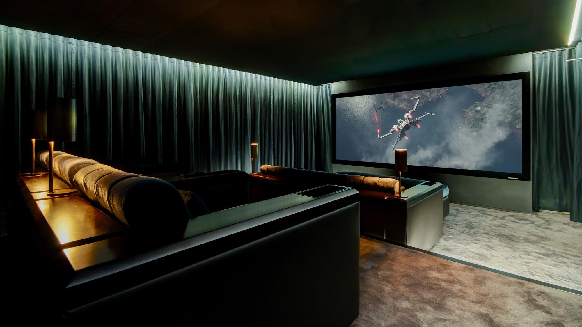 Green toned dolby atmos dedicated home cinema with artcoustic sound