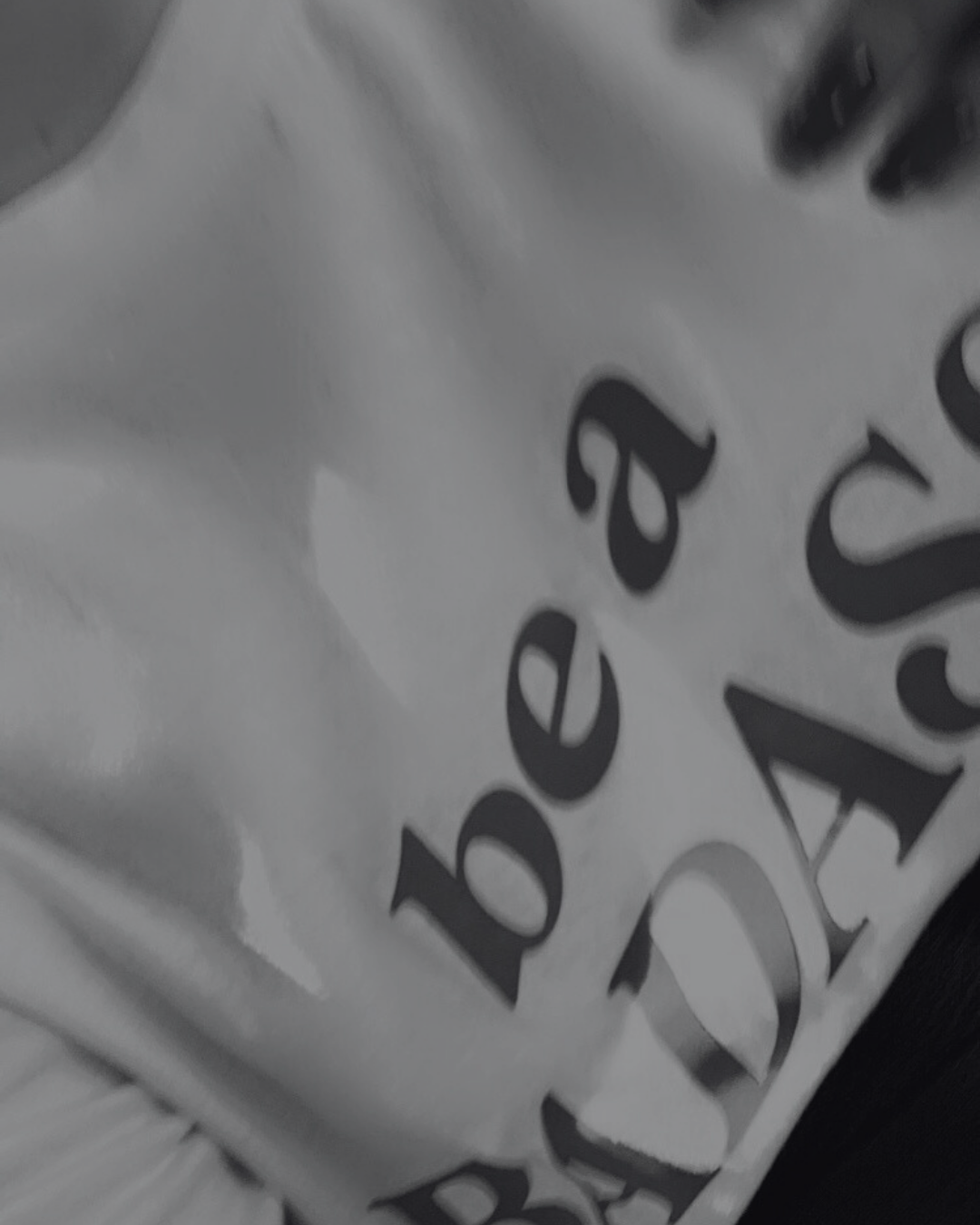 Close-up of white packaging material with black printed text.