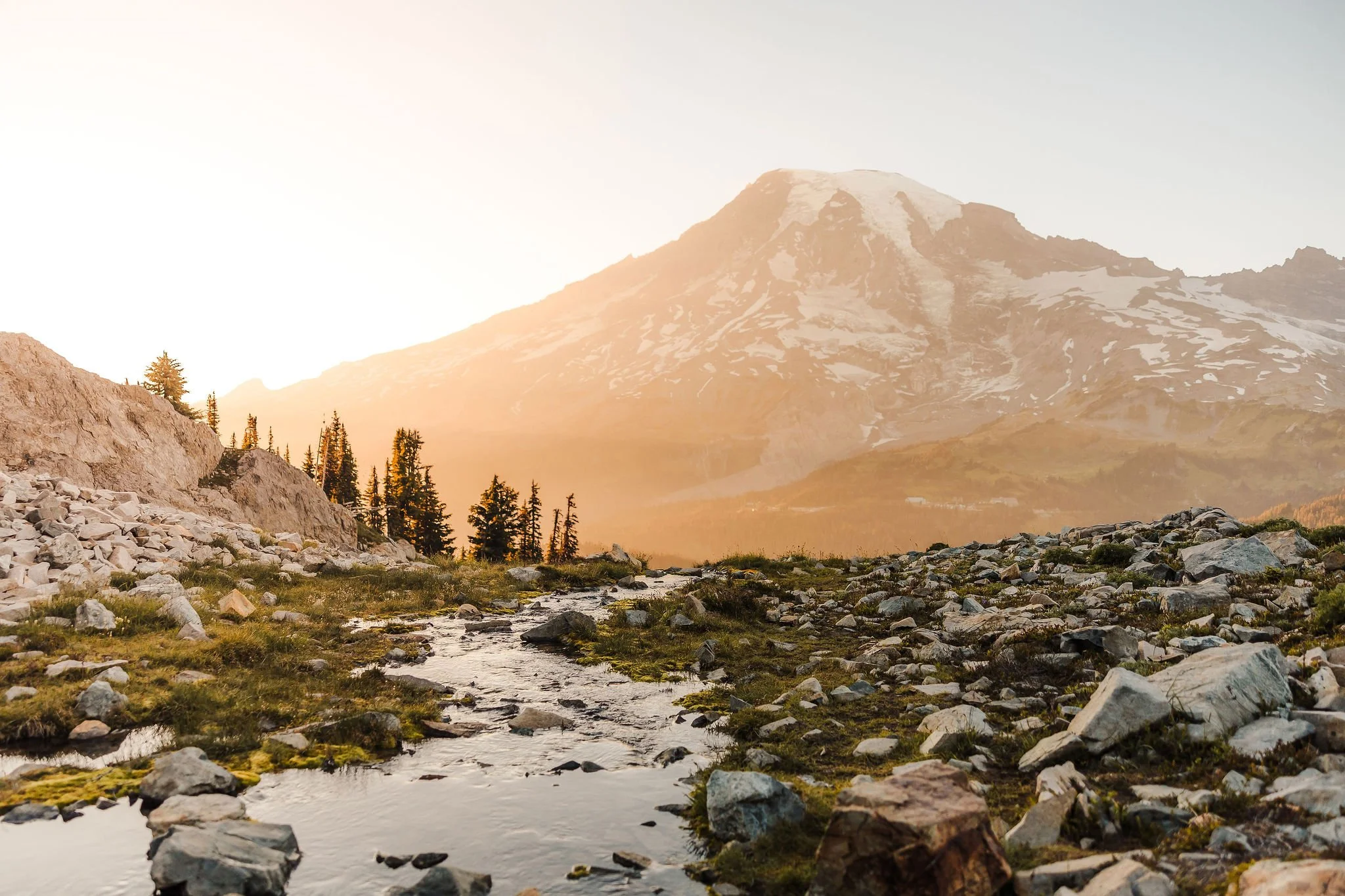 Sunset view of Mount Rainier from the Pinnacle Peak Tarn in the Paradise area, a scenic elopement location in Mount Rainier National Park