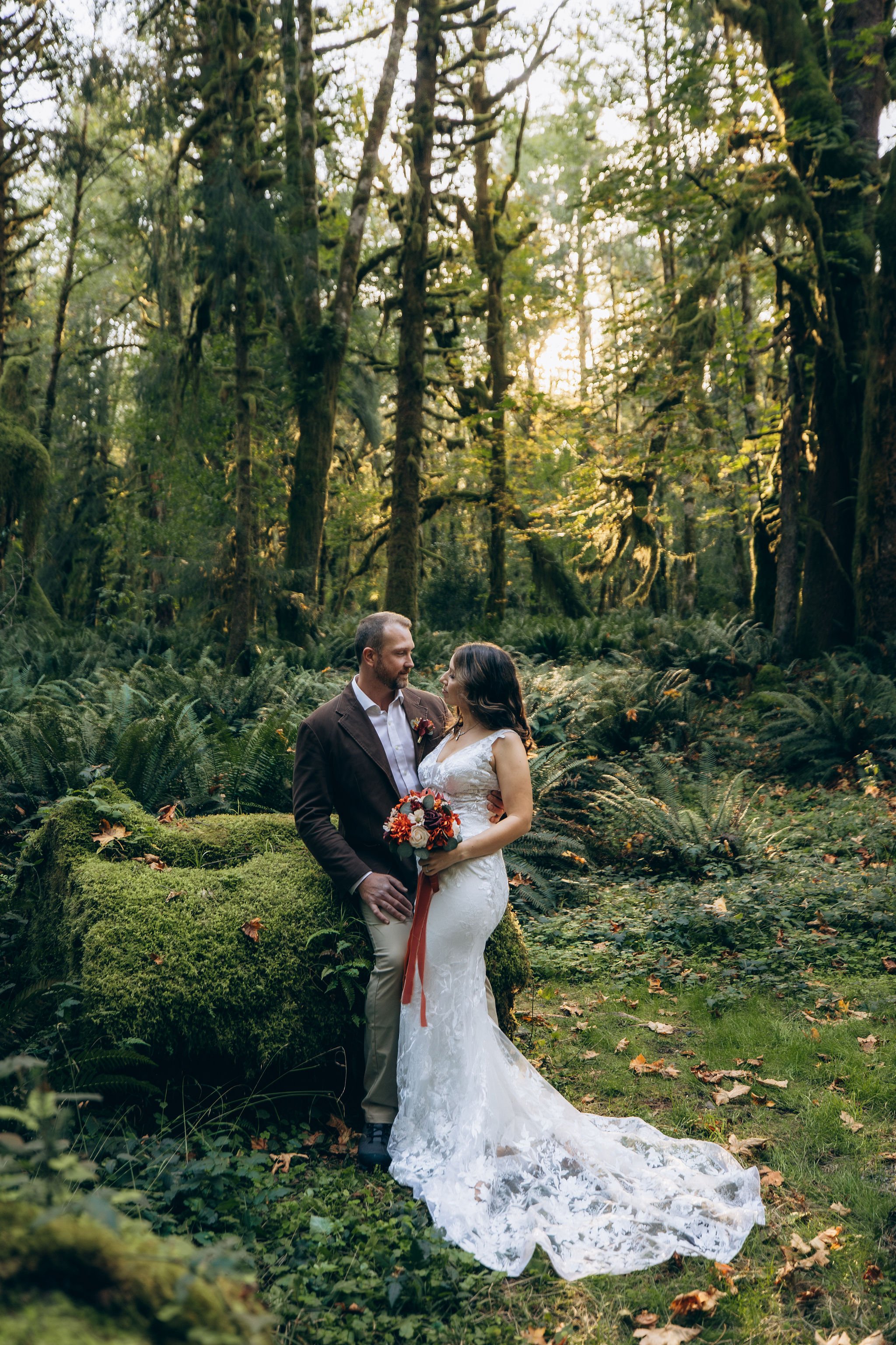 Bride and groom in the Quinault Rainforest during their Olympic National Park elopement