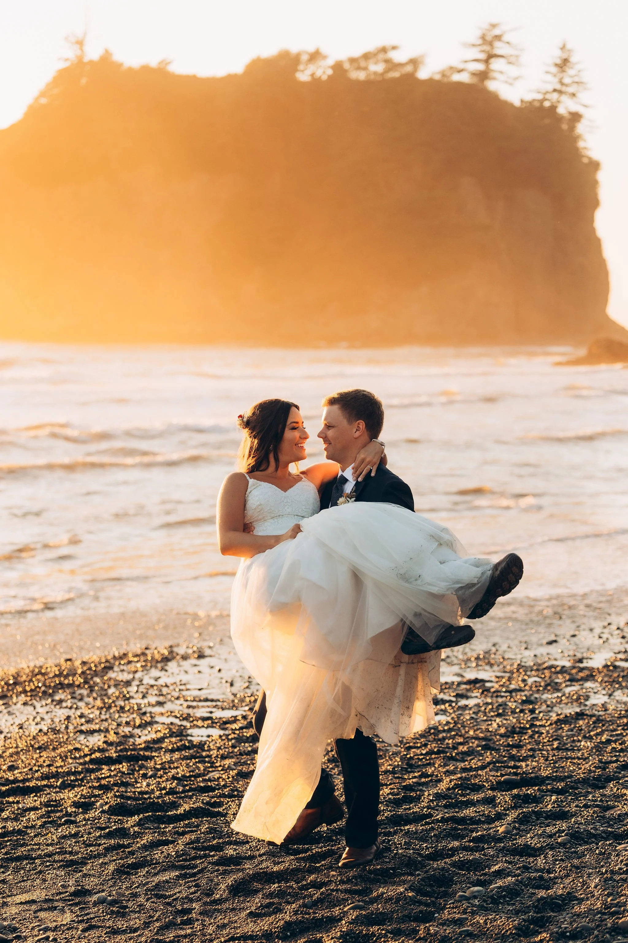 Couple at sunset during an elopement on the Washington coast in the Pacific Northwest