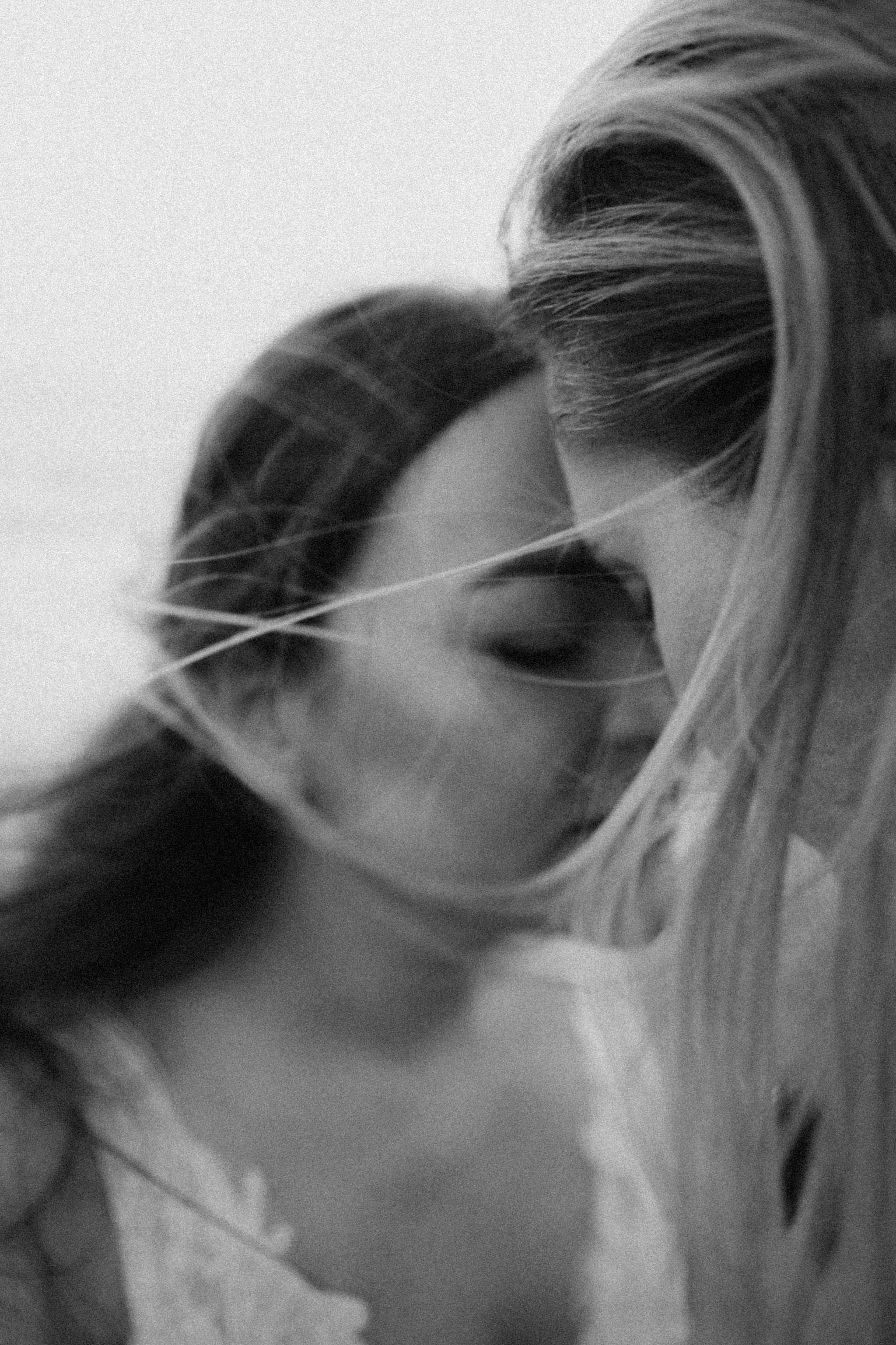 Intimate moment between brides during a Pacific Northwest elopement