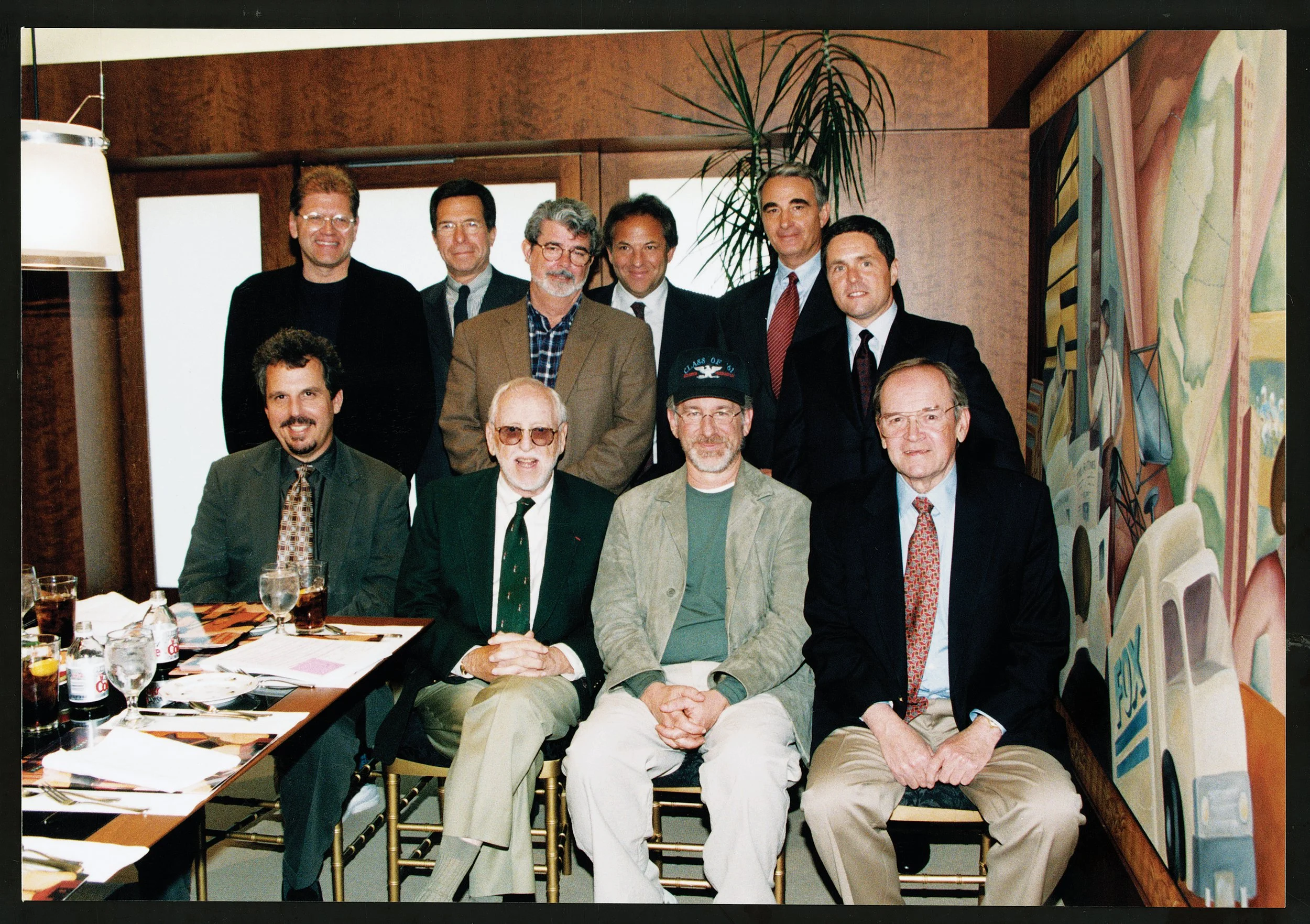 Price (seated far right) met with fellow members of the School of Cinematic Arts Board of Councilors at a meeting to discuss plans for the Robert Zemeckis Center for Digital Arts, which began construction in 1999. Seated L-R:  Bill Mechanic, David L.