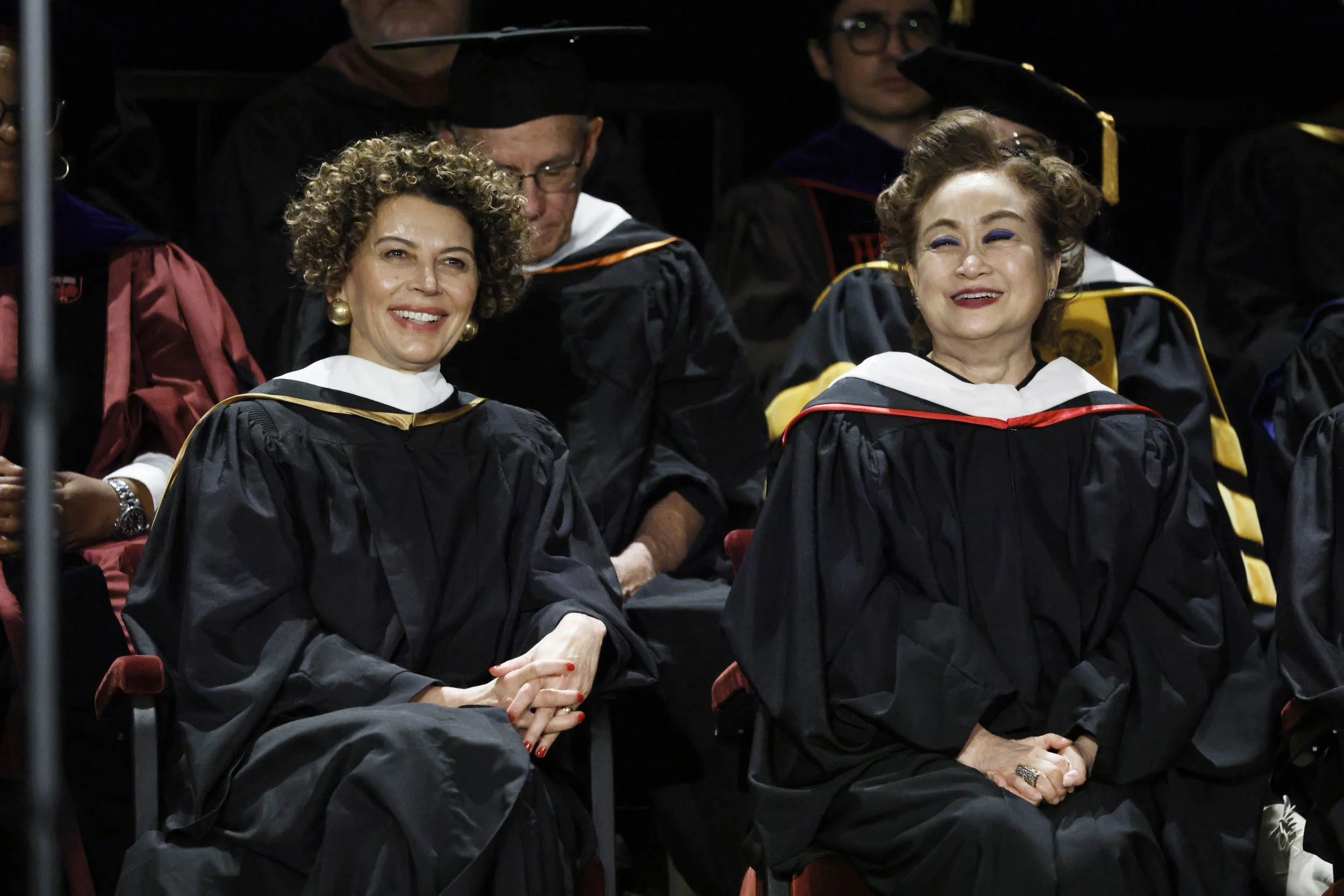 SCA Board of Councilors Chair Donna Langley with 2025 Commencement speaker Miky Lee at the USC School of Cinematic Arts Commencement Ceremony, Shrine Auditorium.