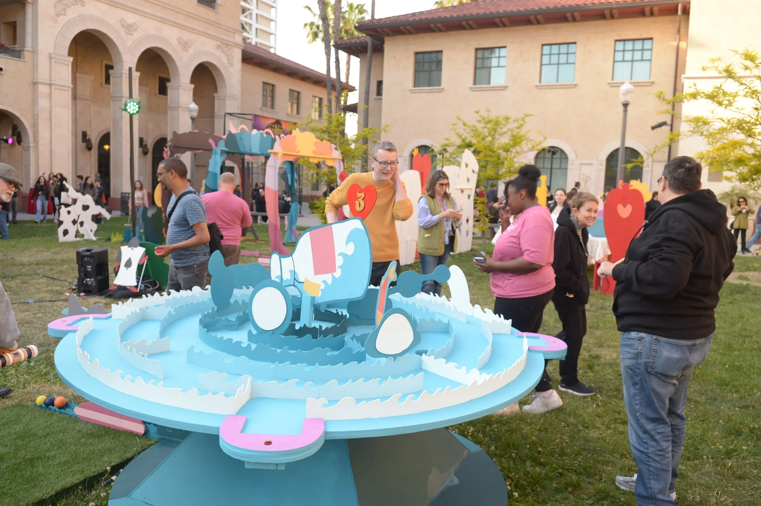 Guests playing the interactive mini golf course at the USC Games Expo.