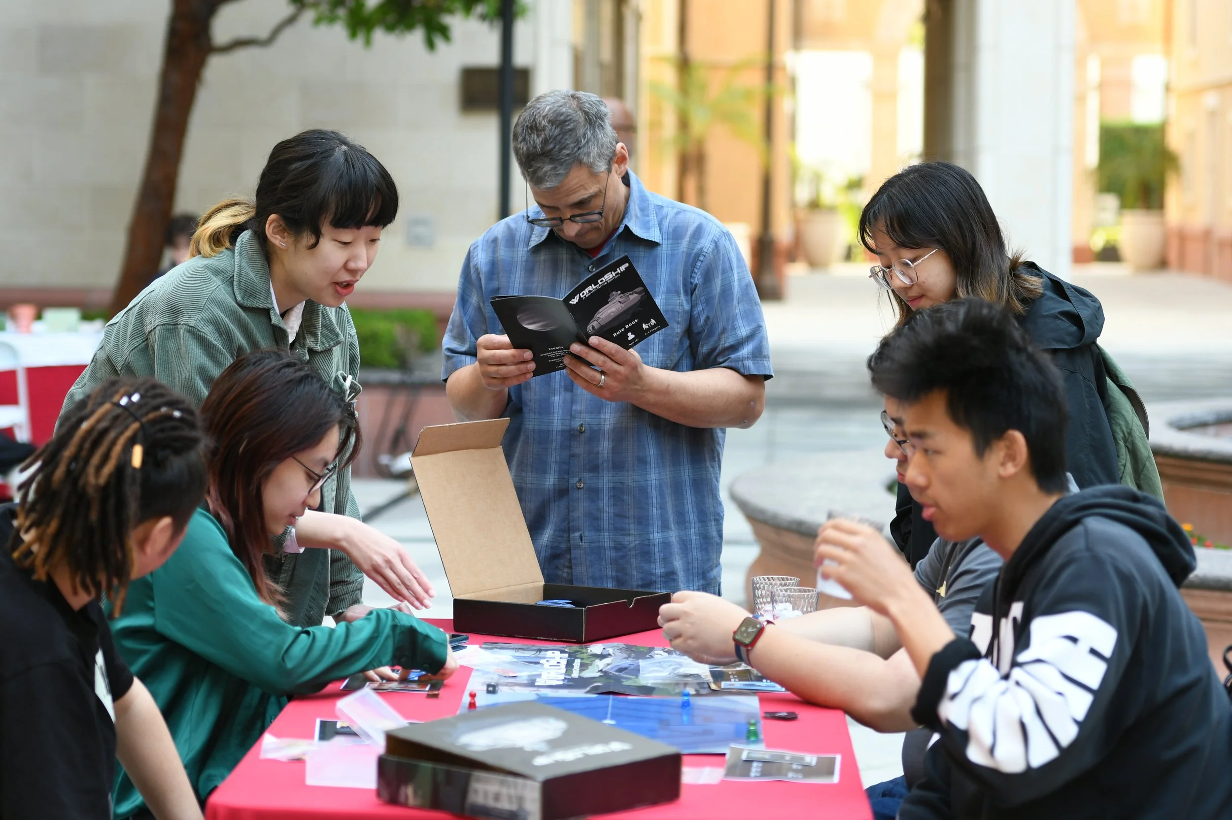 Students playing their board games in the Main SCA Courtyard.