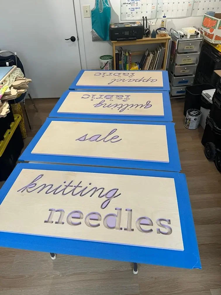 Sign painting process in studio