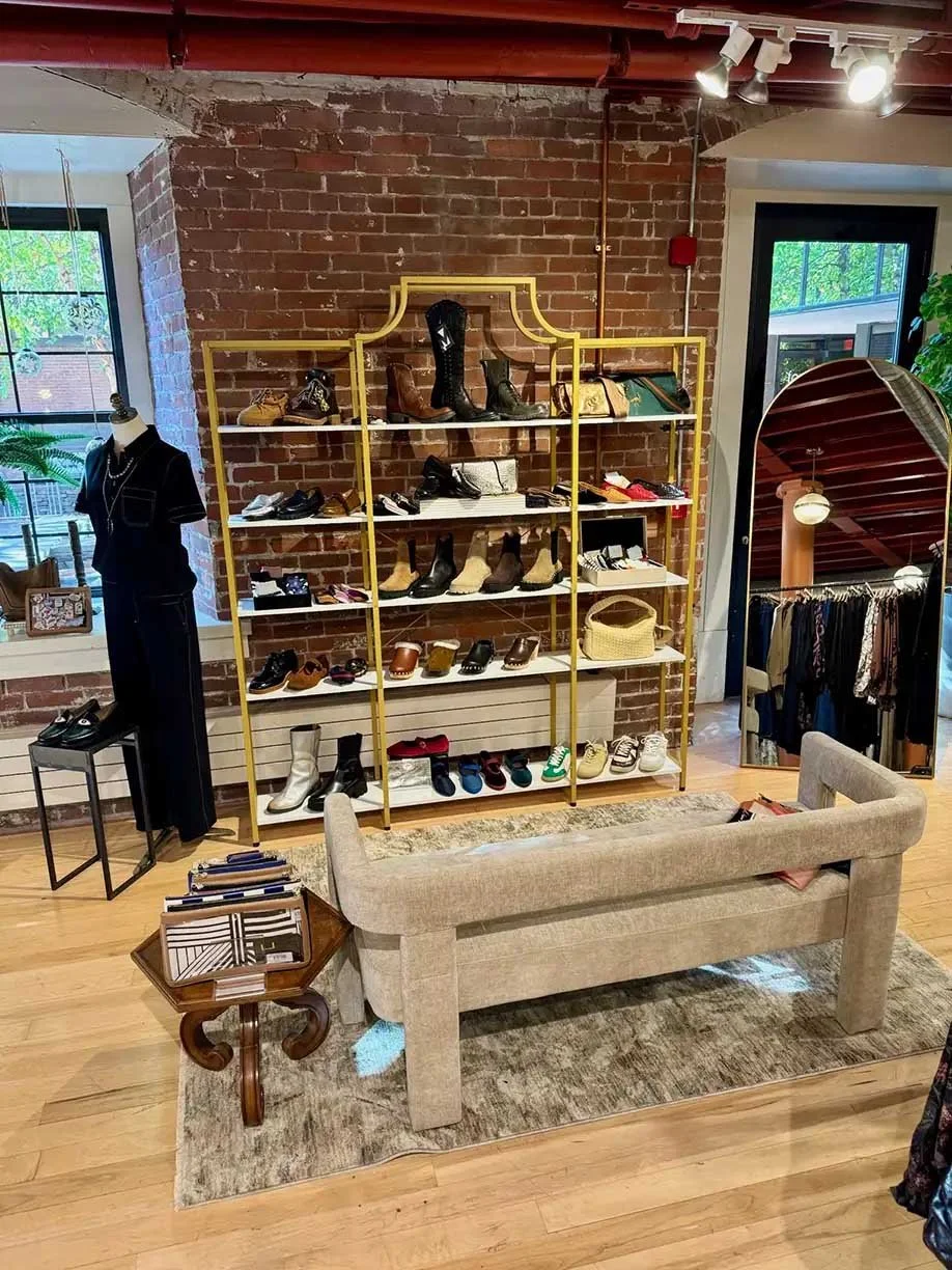 Shoe fixture against brick wall