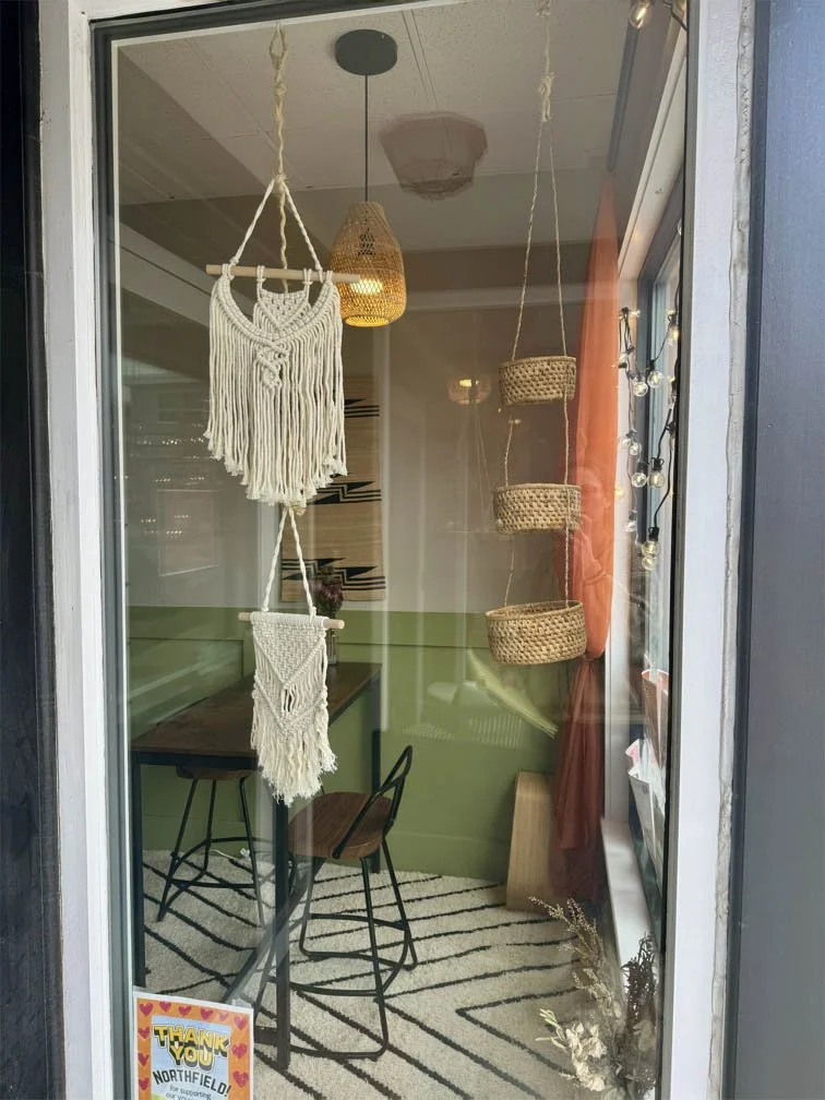 right side window view of hanging macrame