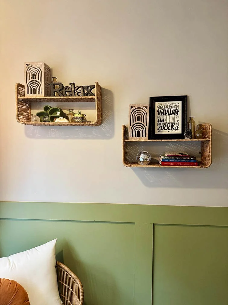 closeup view of styling on floating shelves