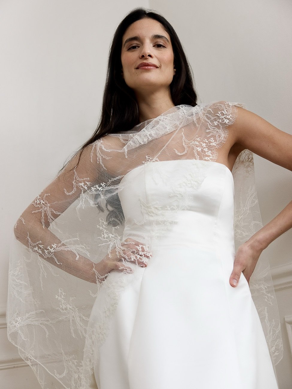 For the bride who moves between moments&mdash;ceremony, celebration, quiet reflection &mdash; our capes in Calais lace and silk offer effortless elegance, tailored to your day, your way.

Swipe to discover the versatility of understated luxury.

To b
