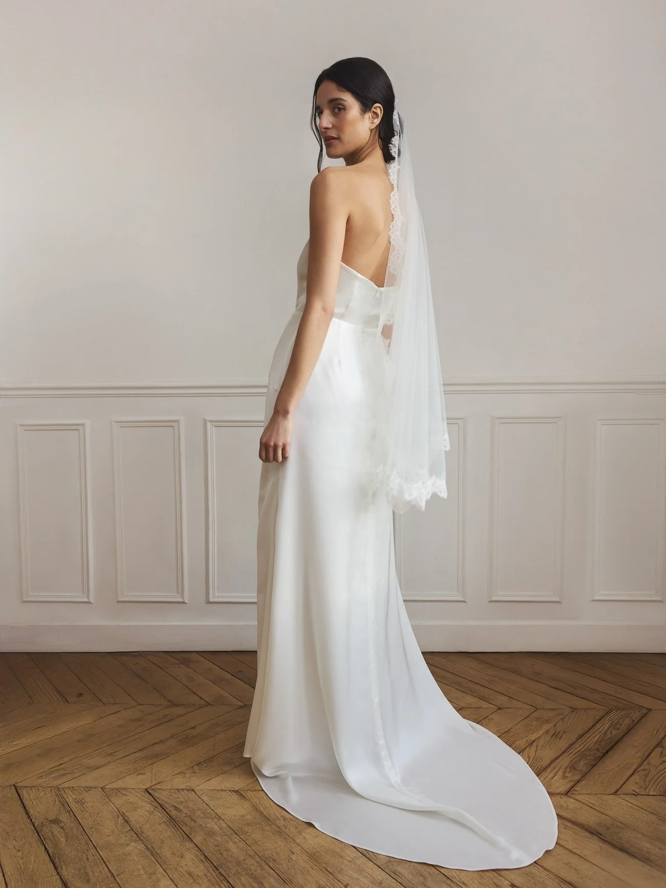 The final touch is never an afterthought.

Complete your bridal silhouette with a veil crafted in exquisite Calais lace &mdash; designed to echo the textures, movement and effortlessness of your gown.

Visit our showroom to discover a curated selecti