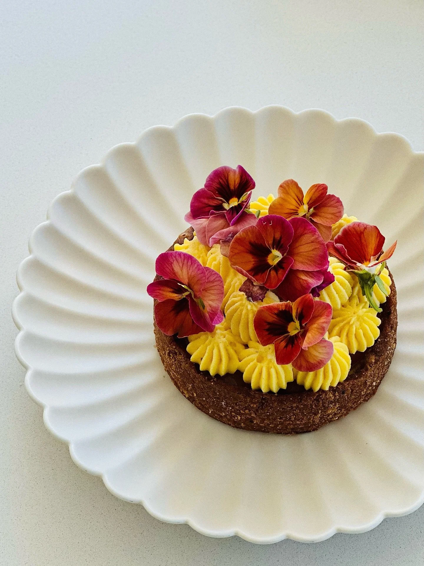 SAFFRON CARDAMOM APRICOT TART

Inspired by Khubani ka Meetha &mdash; the regal Hyderabadi dessert with roots in the royal kitchens of the Nizams. Traditionally made by slow-simmering dried apricots with sugar and cream, it&rsquo;s a dessert that embo